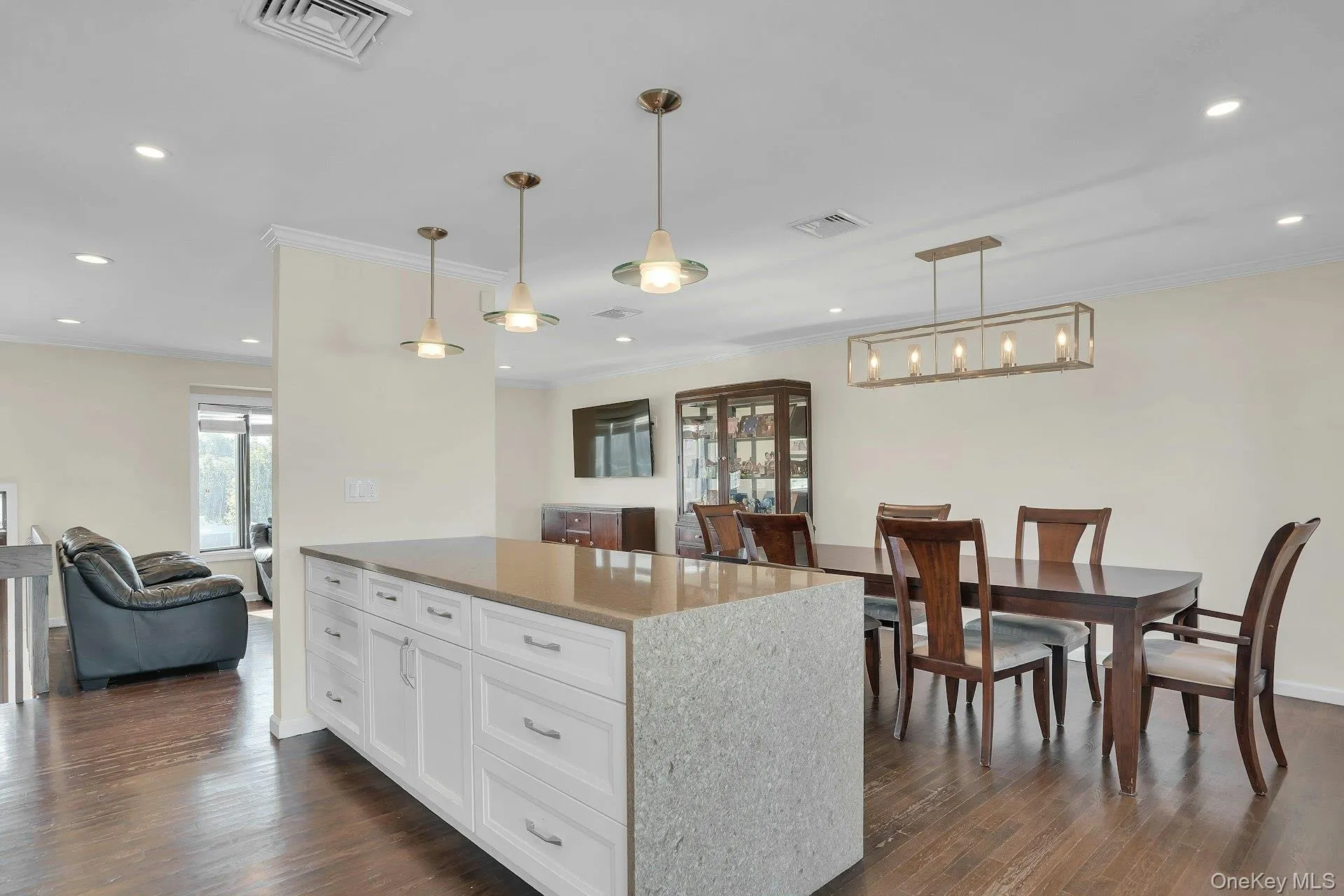 Large center island with seating for 3. Large center island with seating for 3.