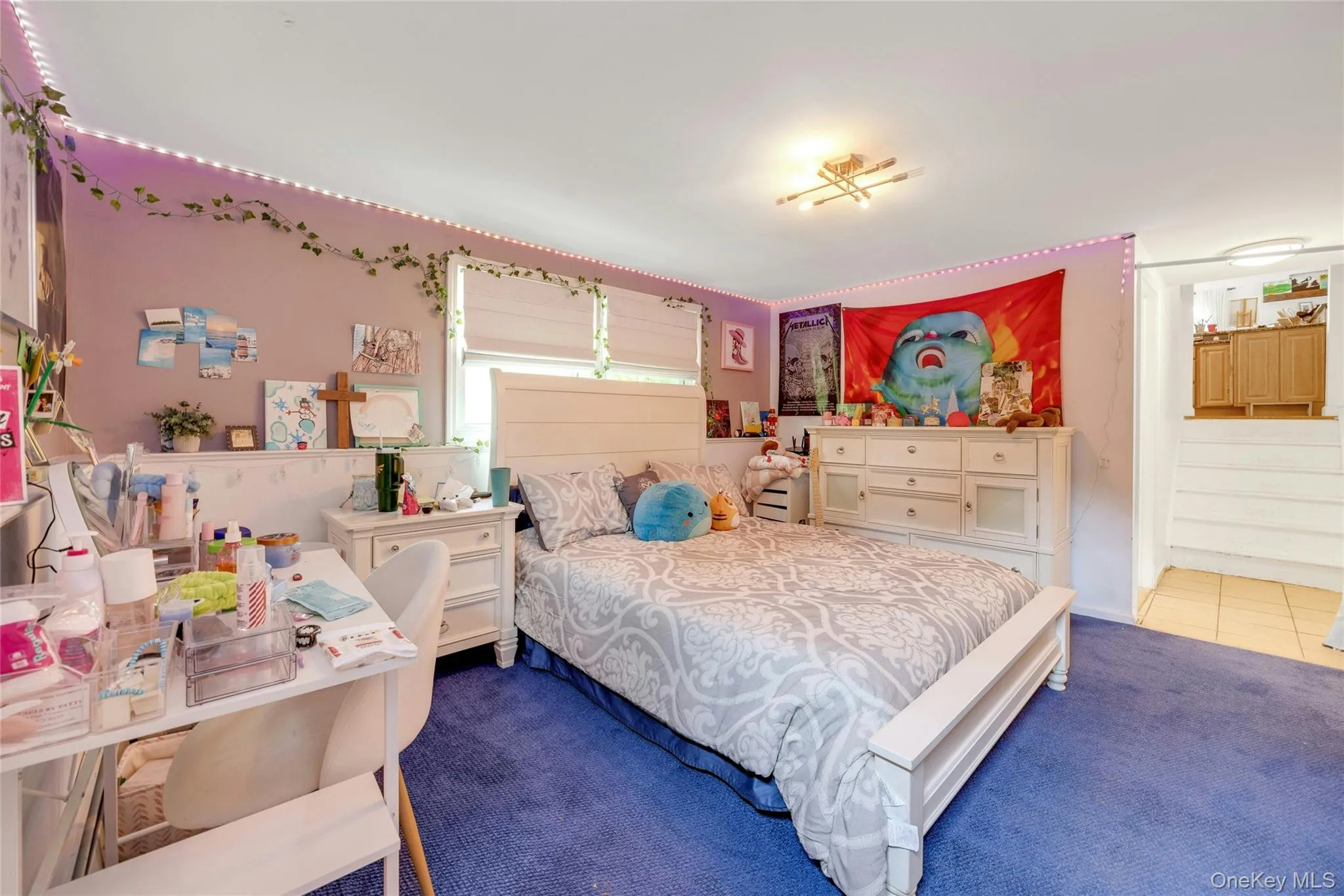 Recessed window, ceiling-mounted light fixture, recessed wall niche, wood-finish flooring, and shiplap wall paneling Recessed window, ceiling-mounted light fixture, recessed wall niche, wood-finish flooring, and shiplap wall paneling