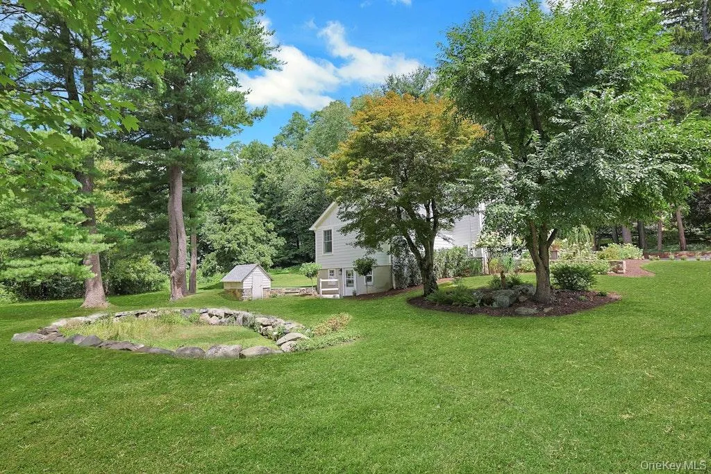 Beautiful, level lawn offering plenty of space for outdoor fun, playtime, and children's playground, the perfect level yard! Beautiful, level lawn offering plenty of space for outdoor fun, playtime, and children's playground, the perfect level yard!