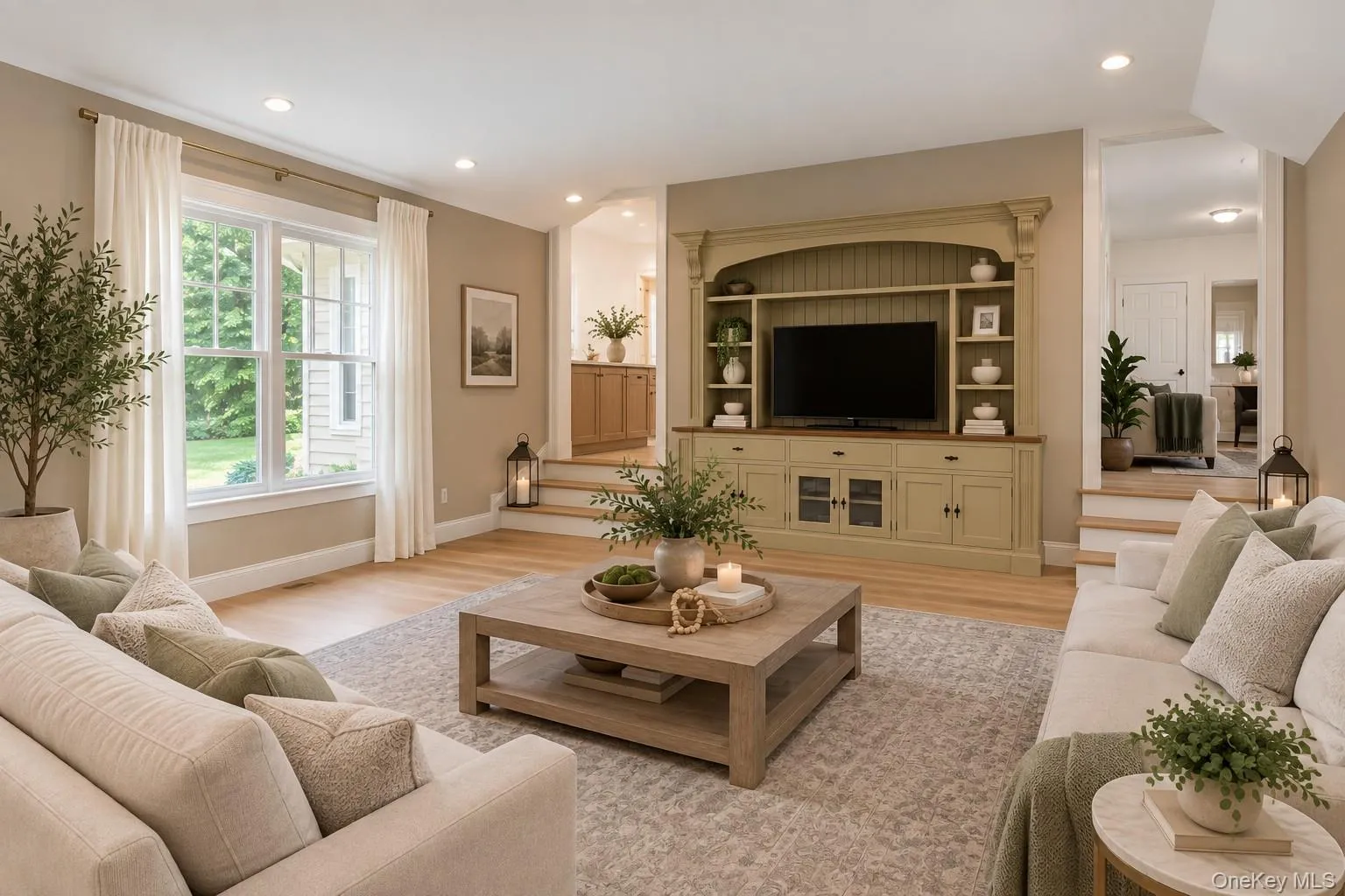 View of this spacious family room, showcasing the abundance of windows, natural light, and inviting layout. View of this spacious family room, showcasing the abundance of windows, natural light, and inviting layout.