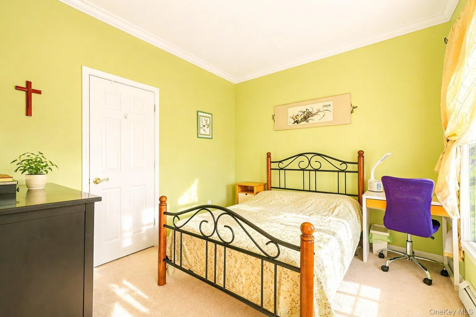 Interior room featuring light green walls, white crown molding, and neutral carpet flooring Interior room featuring light green walls, white crown molding, and neutral carpet flooring