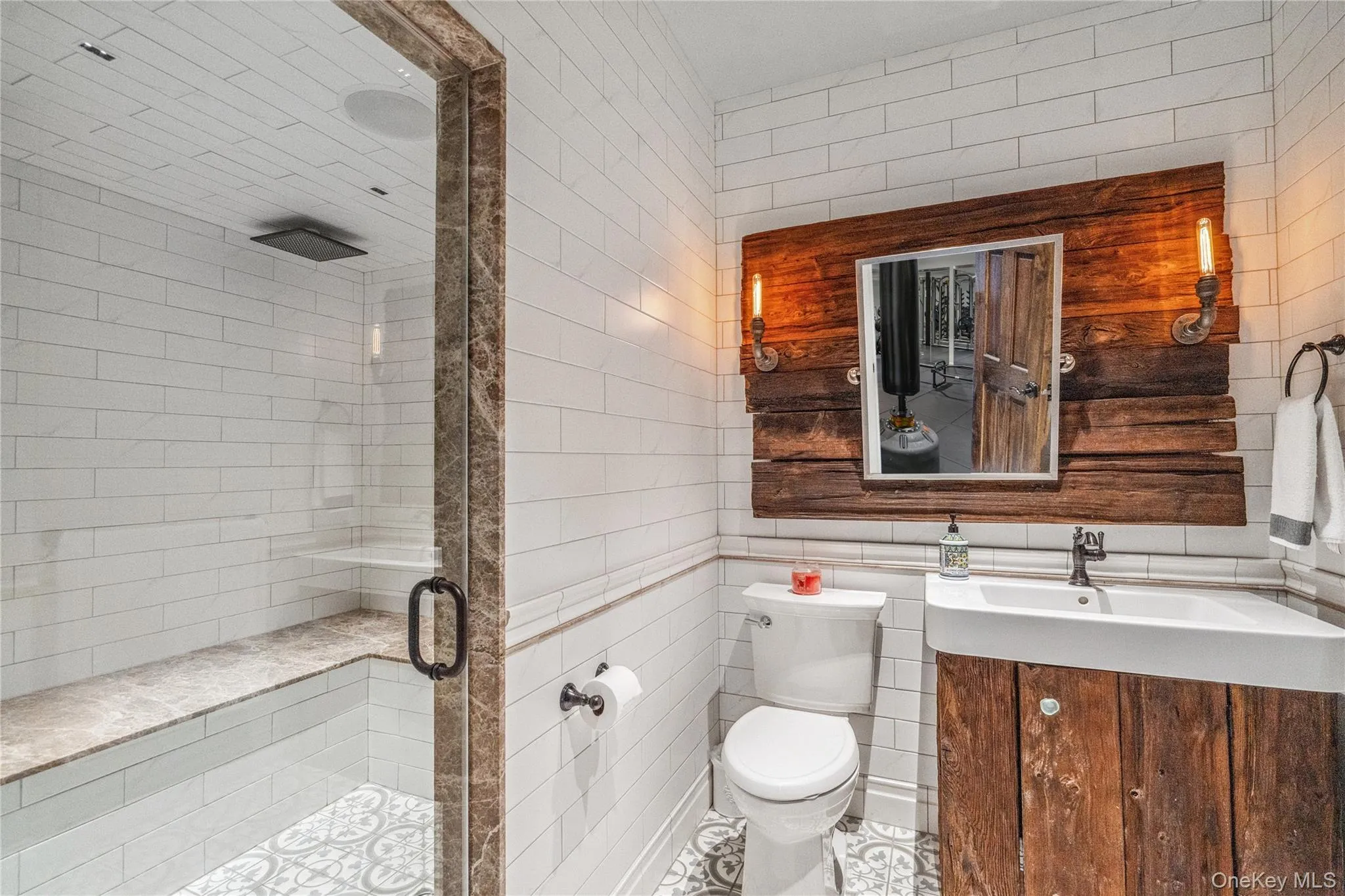Full bath in basement with oversized steam shower Full bath in basement with oversized steam shower