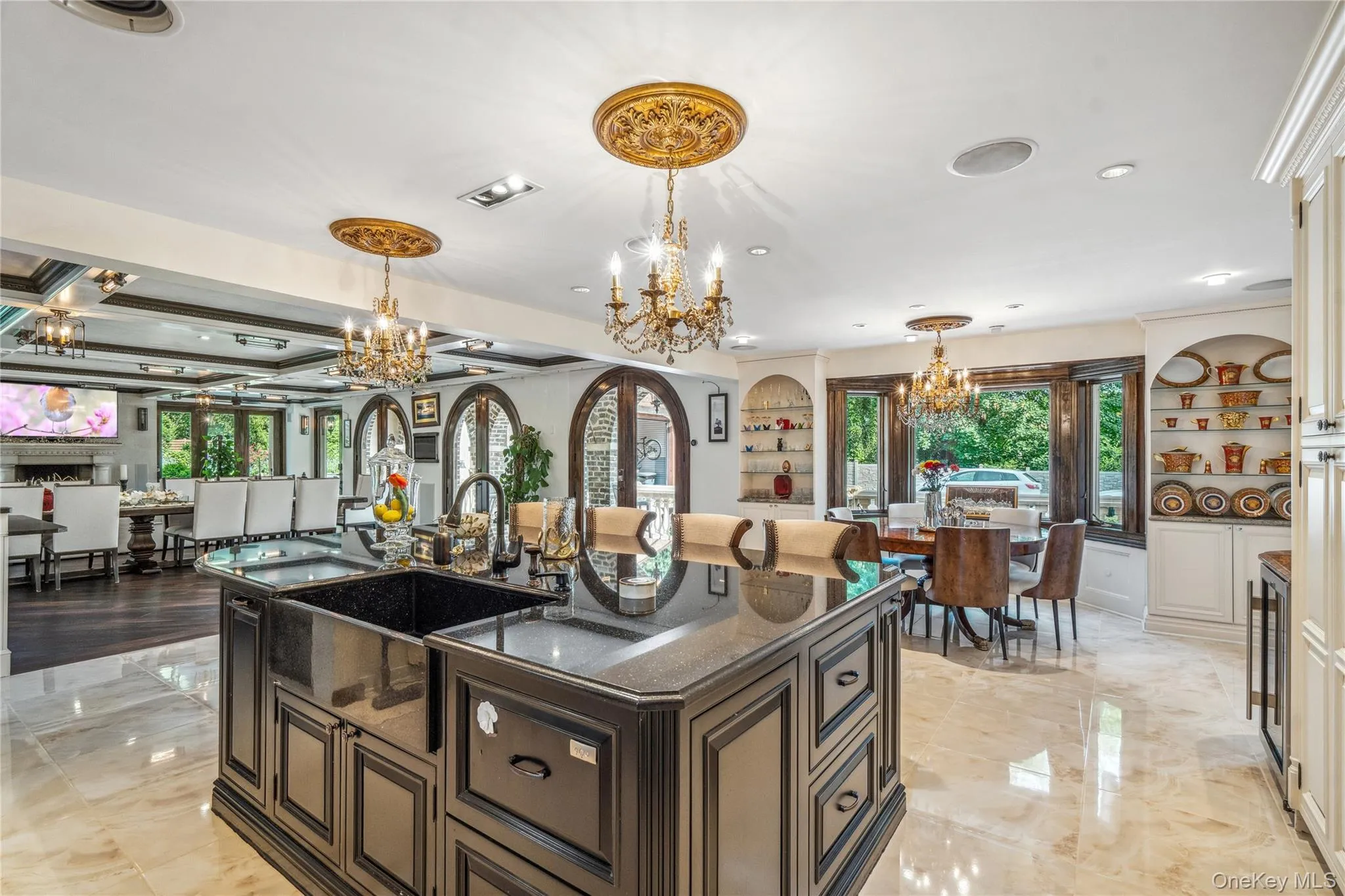 Huge kitchen with heated floor and center island with breakfast bar Huge kitchen with heated floor and center island with breakfast bar