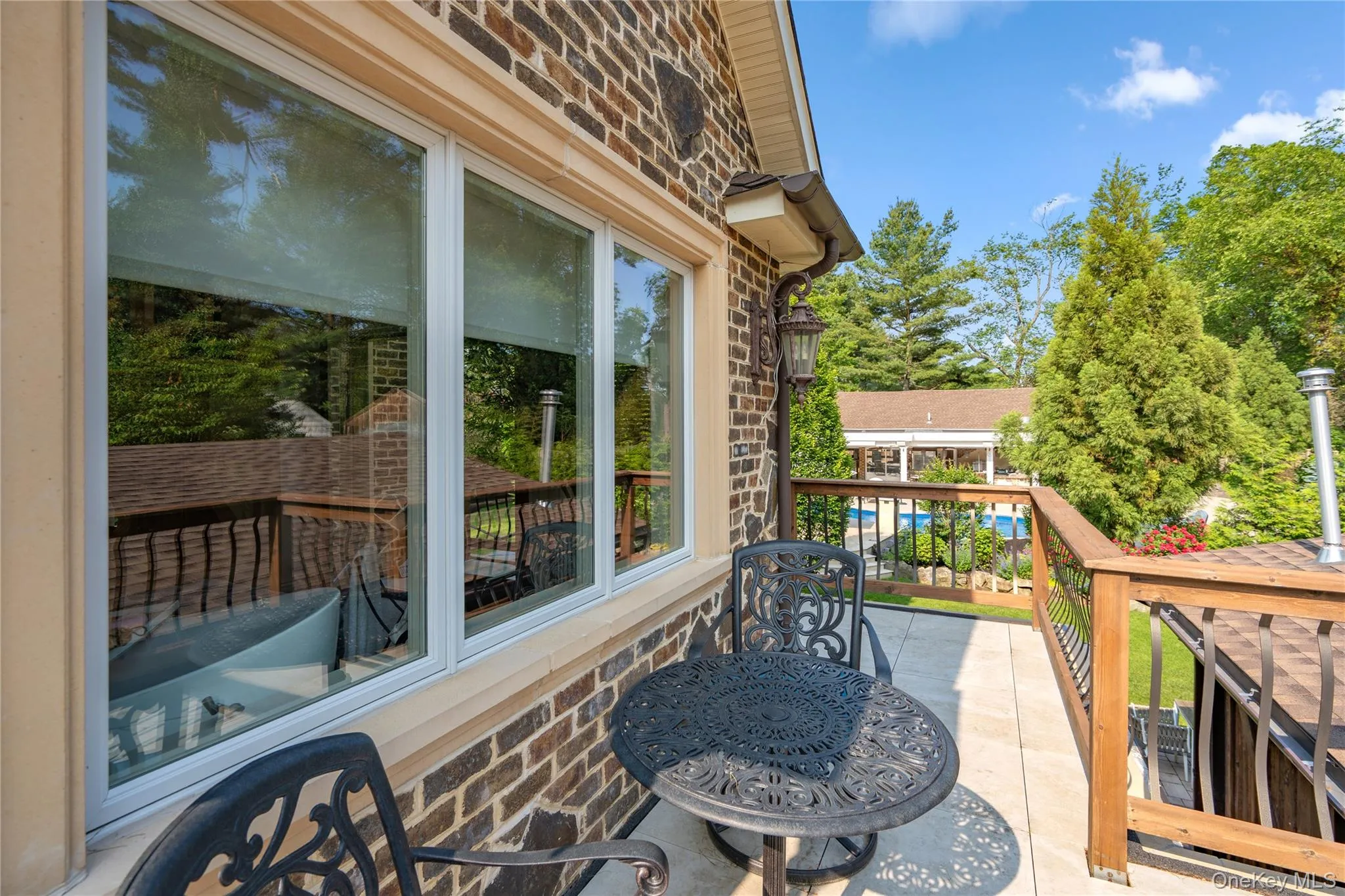 Inviting Private patio off the primary bedroom Inviting Private patio off the primary bedroom