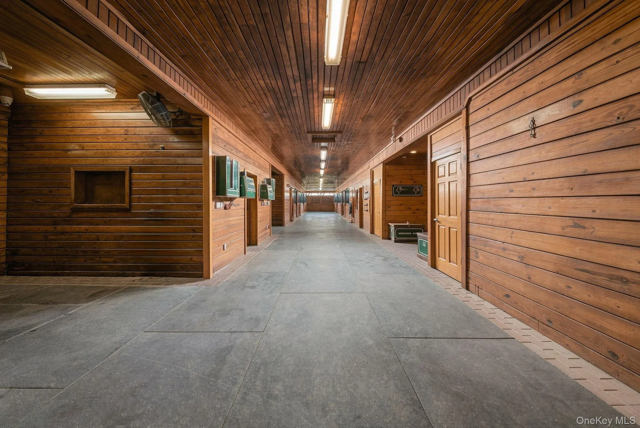 Main Barn Aisle showing grooming/wash stall Main Barn Aisle showing grooming/wash stall