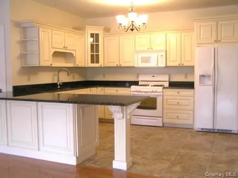 This is the kitchen of the 2-bedroom apartment located in the barn. This is the kitchen of the 2-bedroom apartment located in the barn.