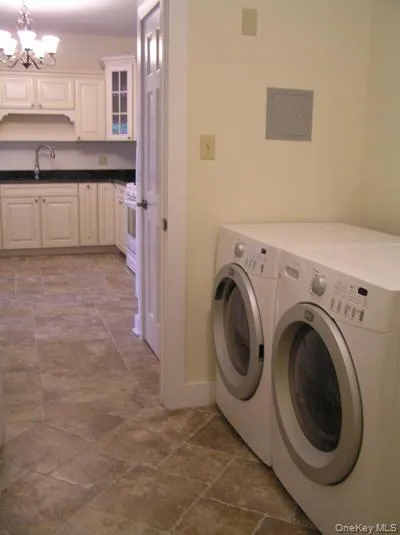Laundry room in the 2-bedroom apartment. There are additional laundry facilities in the main barn. Laundry room in the 2-bedroom apartment. There are additional laundry facilities in the main barn.