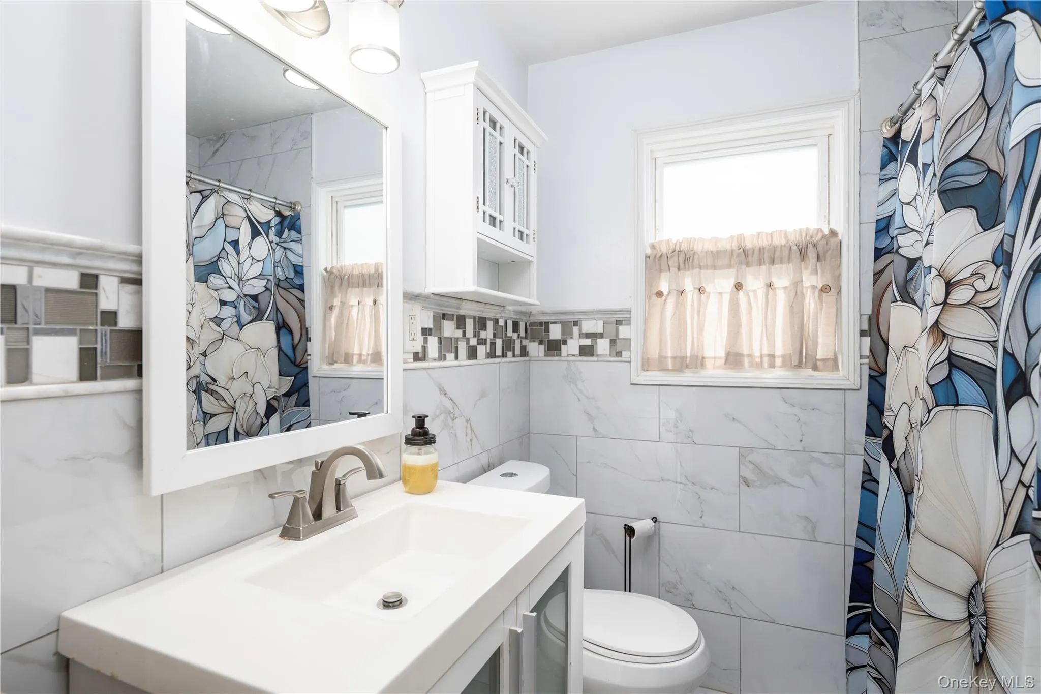 Full remodeled bathroom on main level, tub with shower Full remodeled bathroom on main level, tub with shower