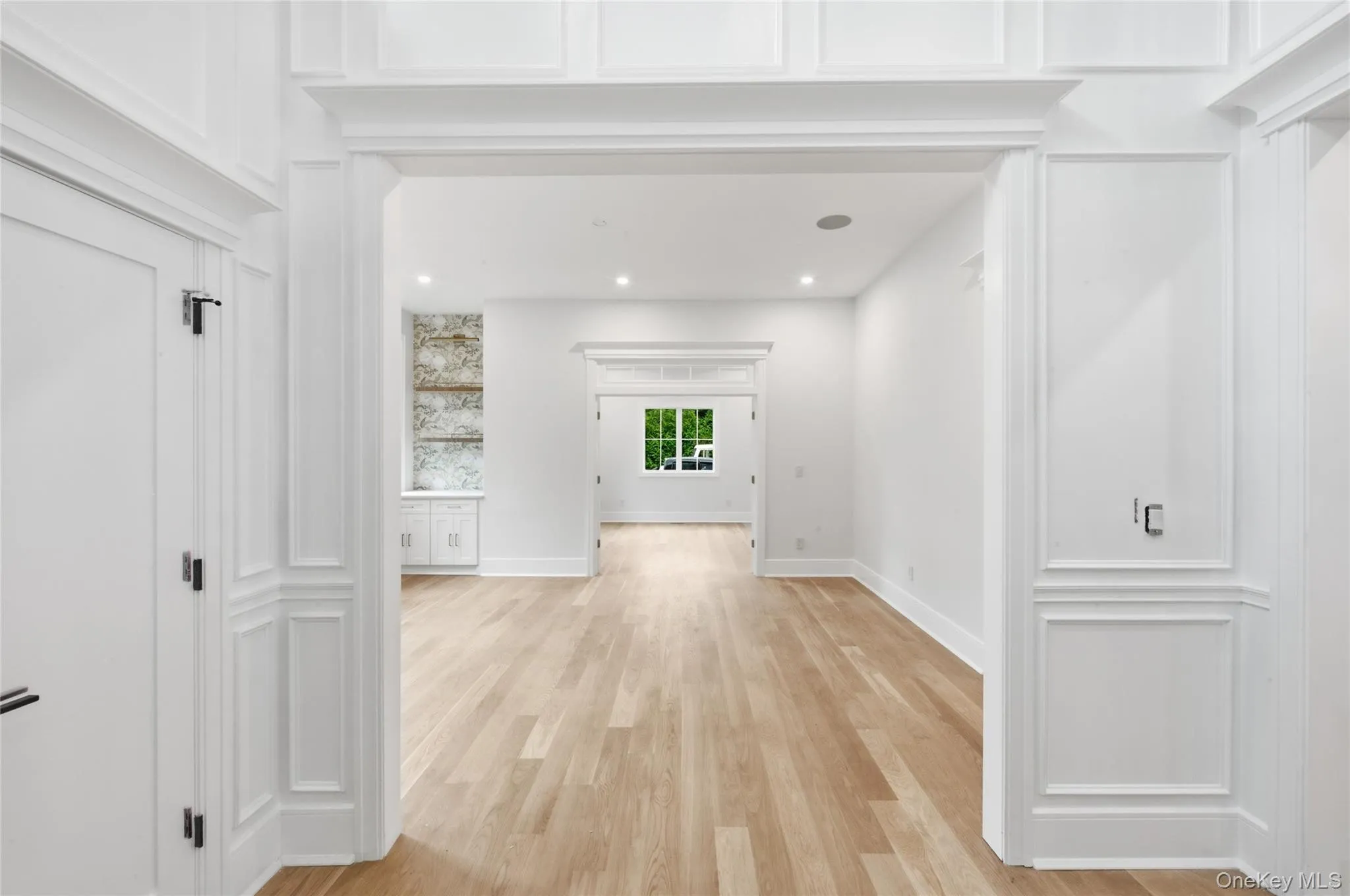 Foyer looking through Dining Room into Office