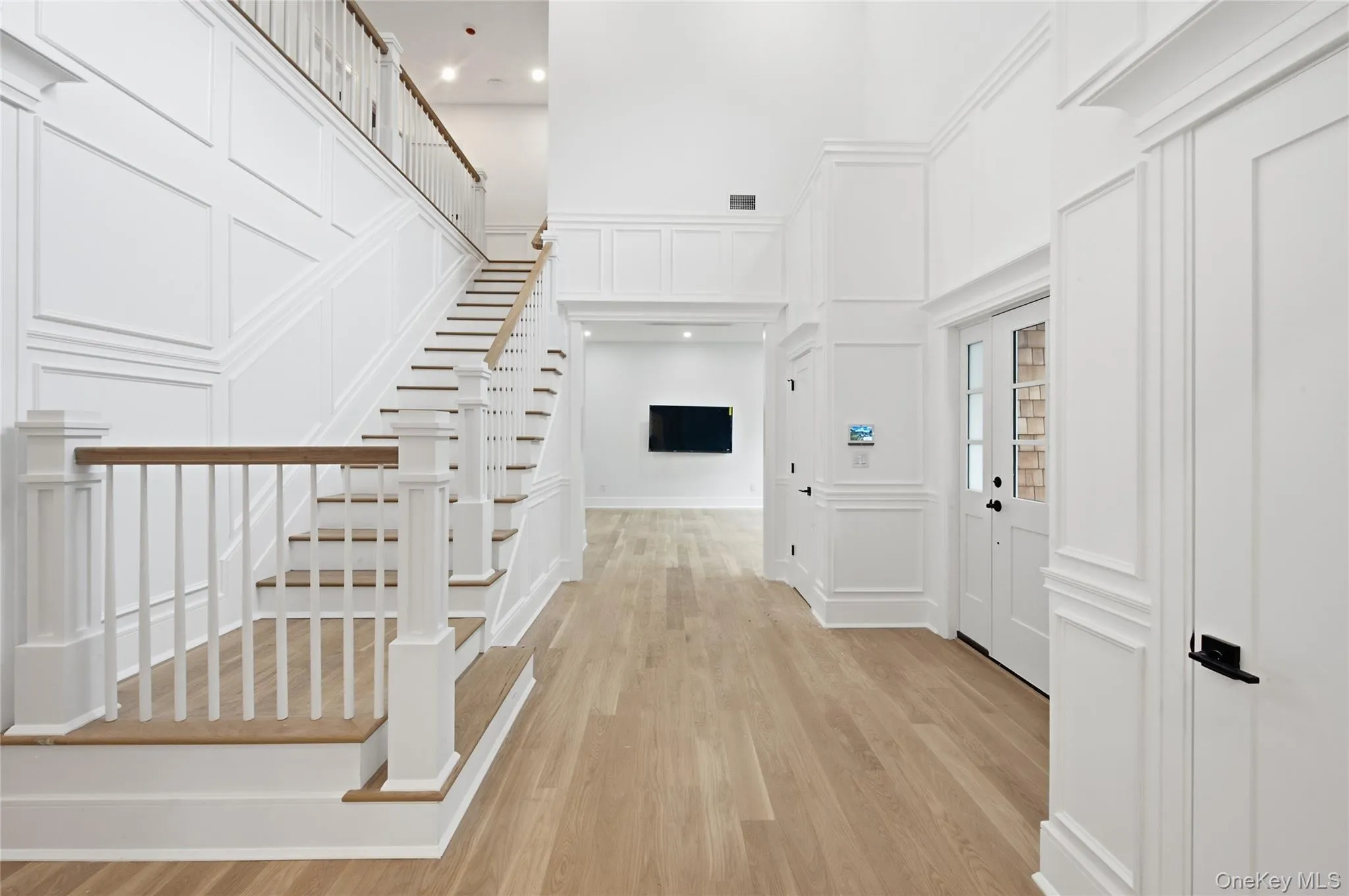 Moldings throughout Foyer and Stairs