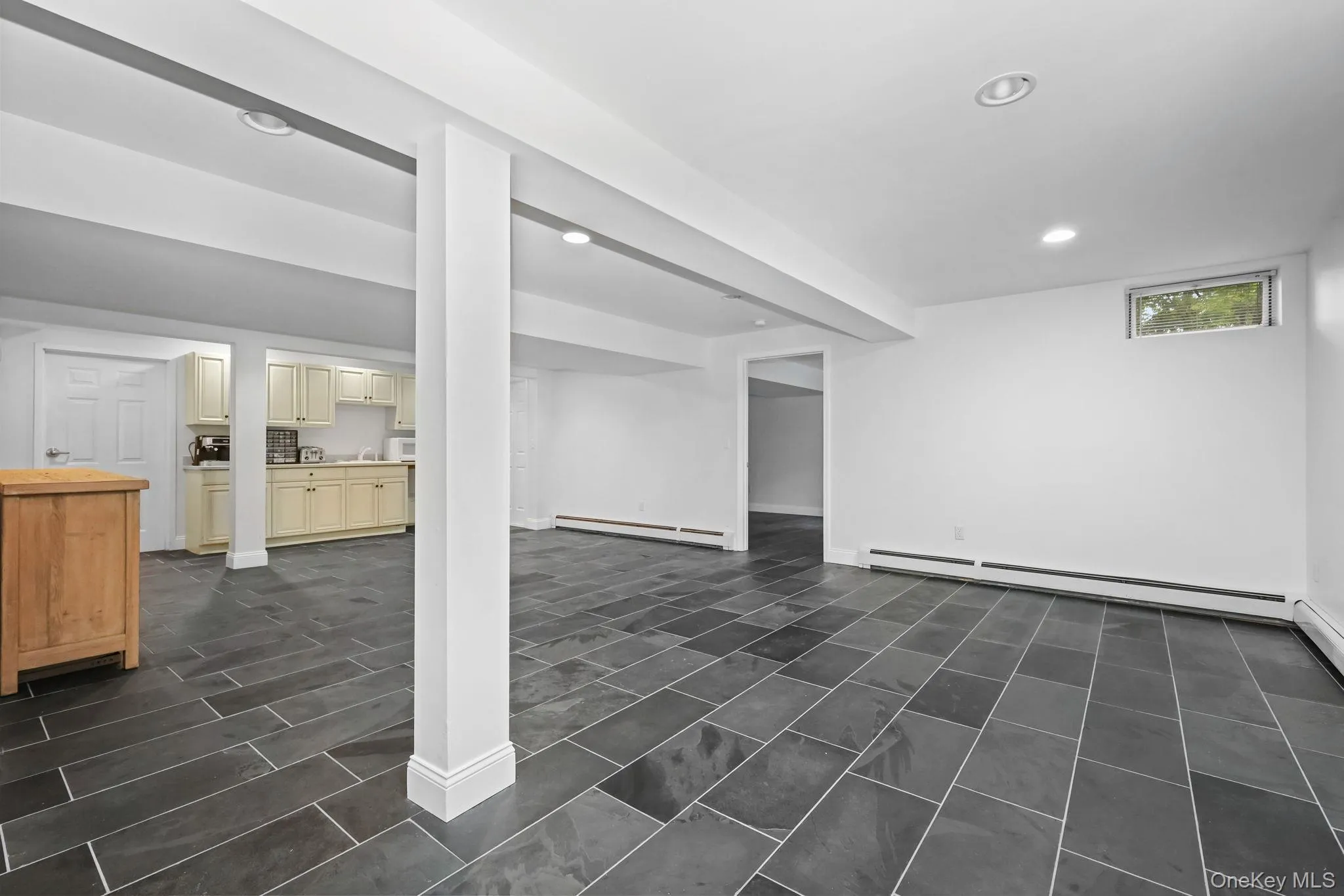 There is a new slate floor in the lower level. There is a new slate floor in the lower level.