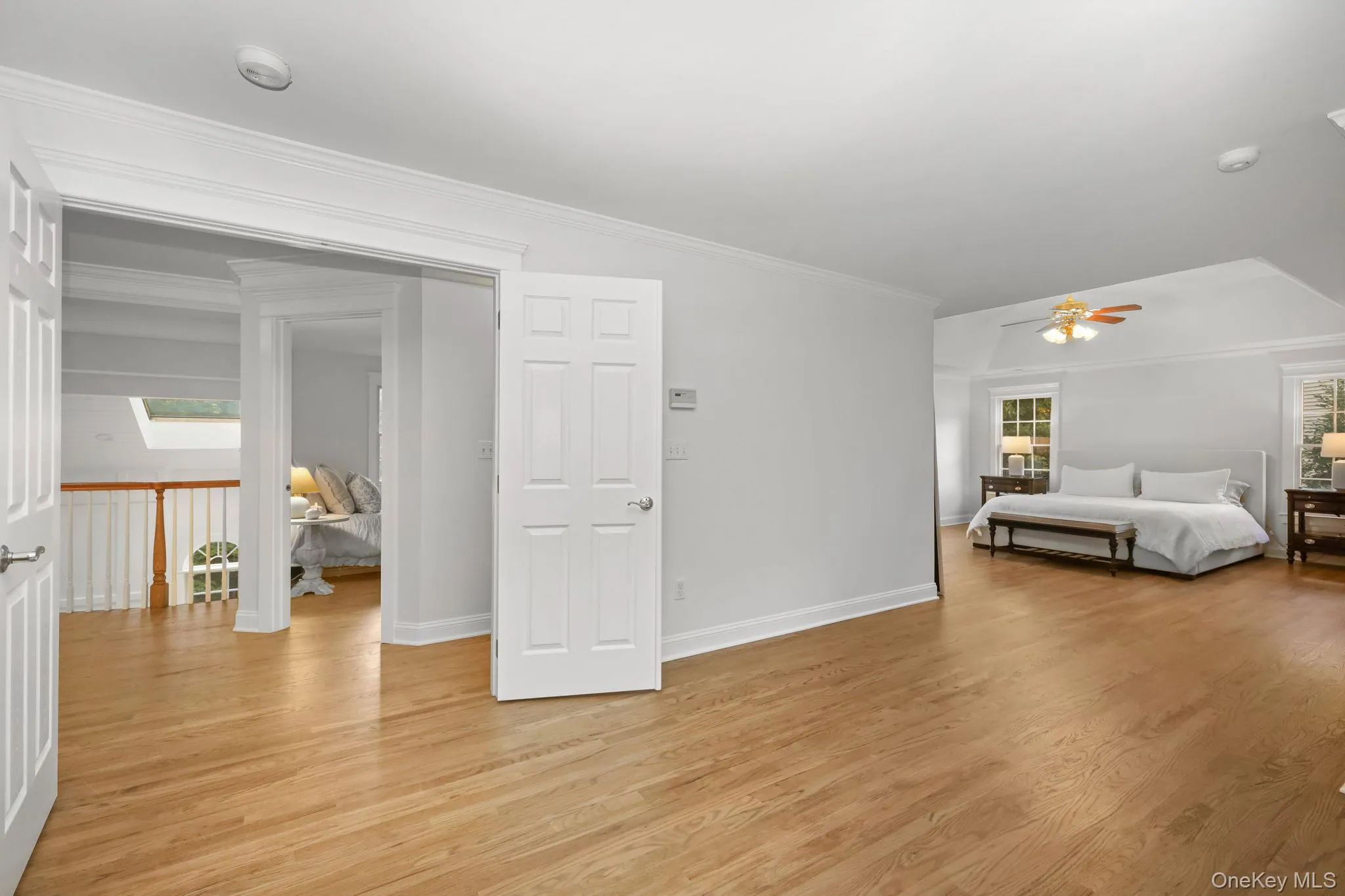 As you enter the primary suite, you are welcomed by a spacious sitting room. As you enter the primary suite, you are welcomed by a spacious sitting room.