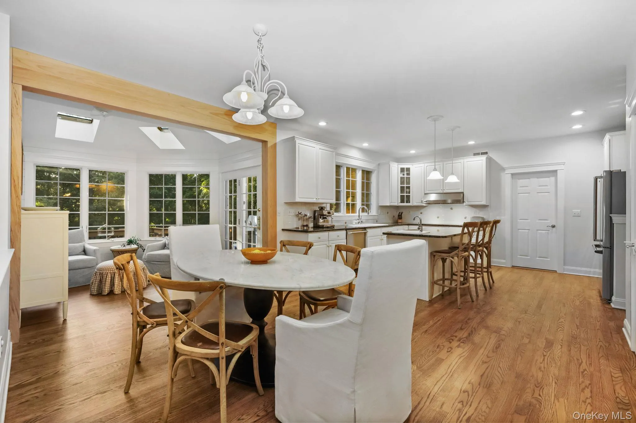 From the kitchen there is a seamless flow into the breakfast area and sun room. From the kitchen there is a seamless flow into the breakfast area and sun room.