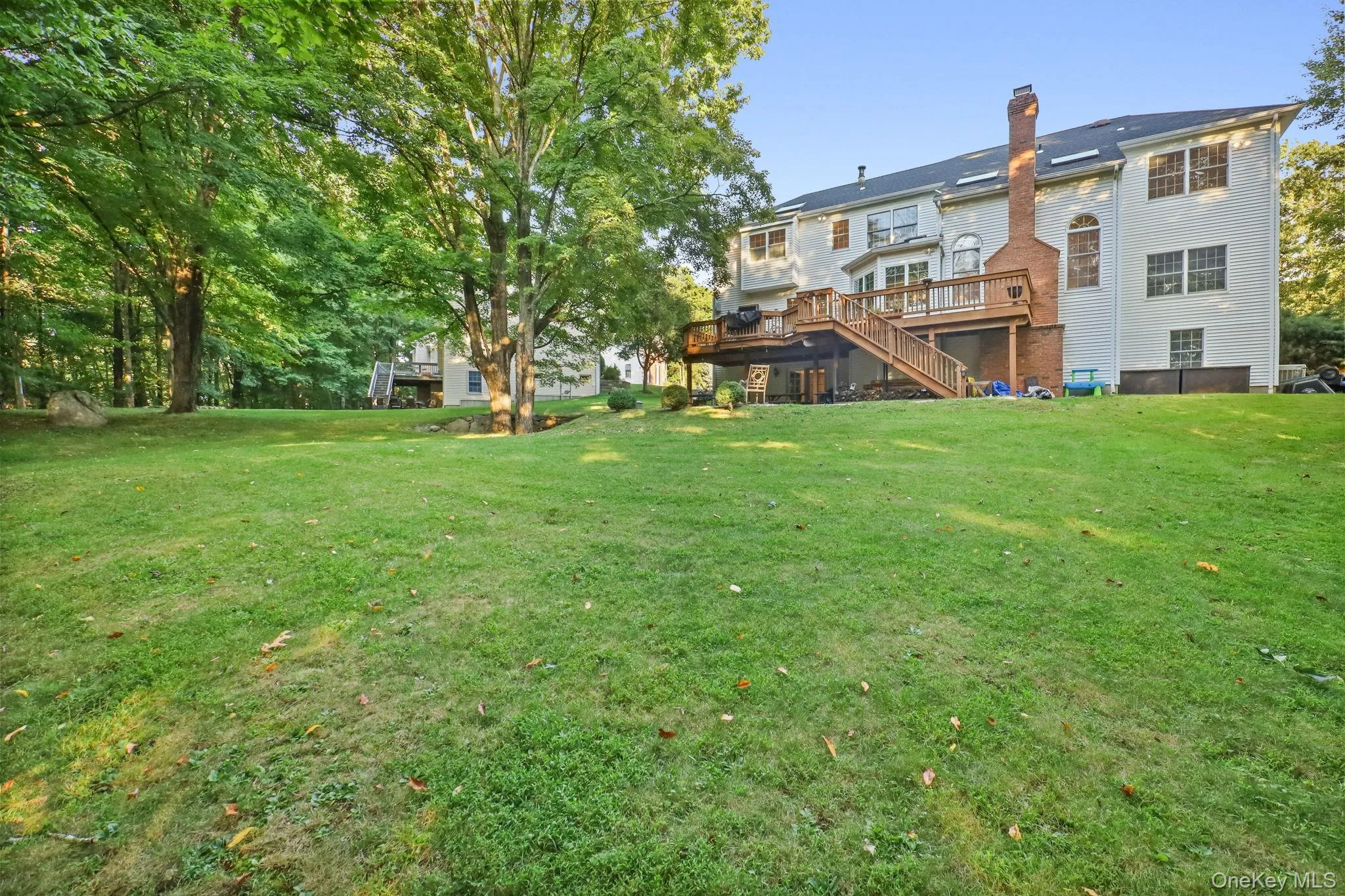 A view of the expansive yard for outdoor enjoyment. A view of the expansive yard for outdoor enjoyment.