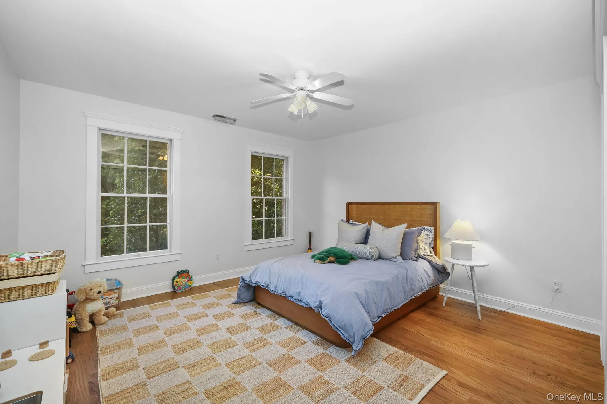 Bedroom 4 offers a double closet and ceiling fan. Bedroom 4 offers a double closet and ceiling fan.