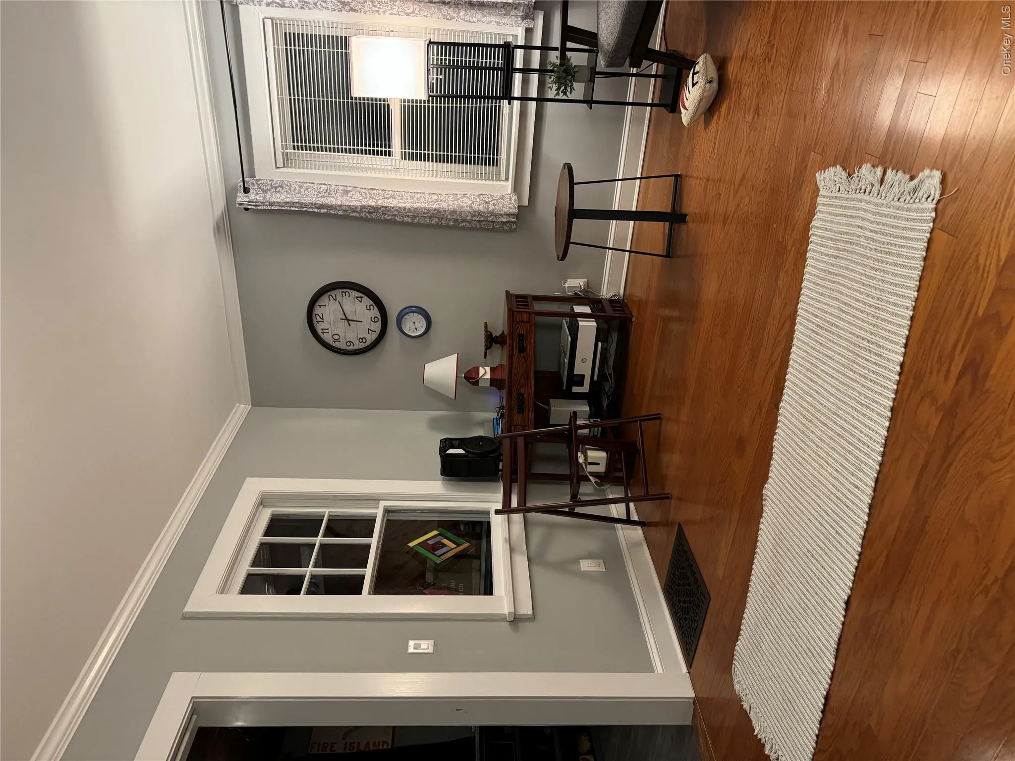 Office space featuring ornamental molding and wood finished floors Office space featuring ornamental molding and wood finished floors