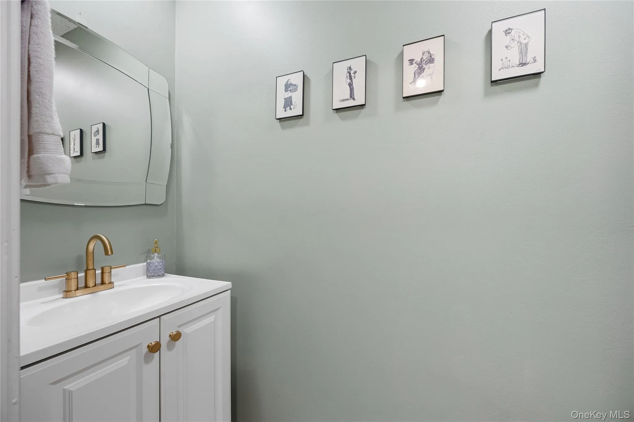 A convenient half bath which has received a recent upgrade completes the main level. A convenient half bath which has received a recent upgrade completes the main level.