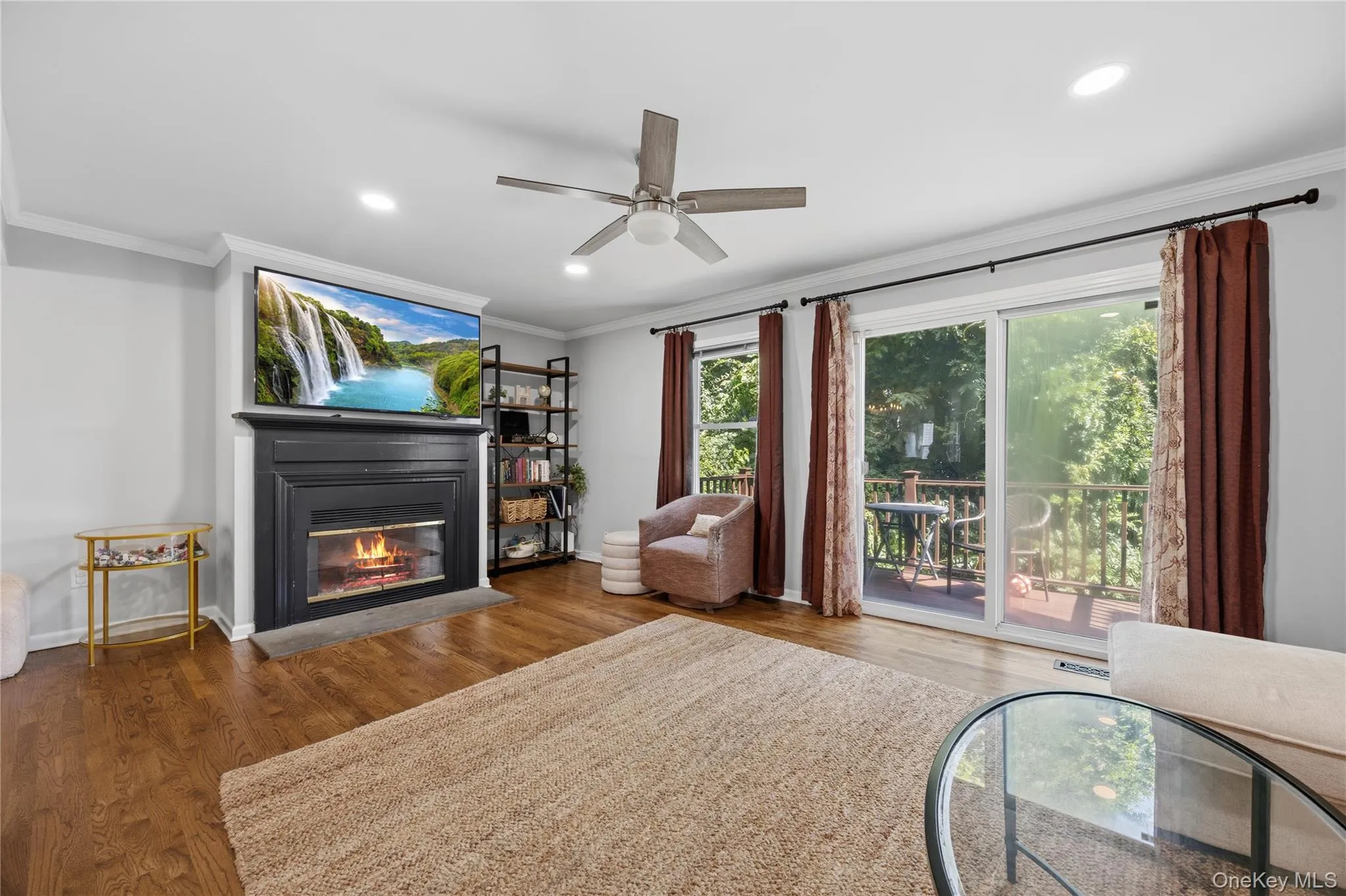 The Living Room is quite spacious and features refinished hardwood floors and sliders to a new private deck. The Living Room is quite spacious and features refinished hardwood floors and sliders to a new private deck.