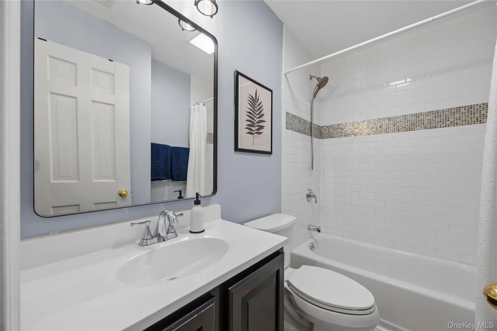 A fully renovated and tastefully appointed hall bath completes the upper level. A fully renovated and tastefully appointed hall bath completes the upper level.
