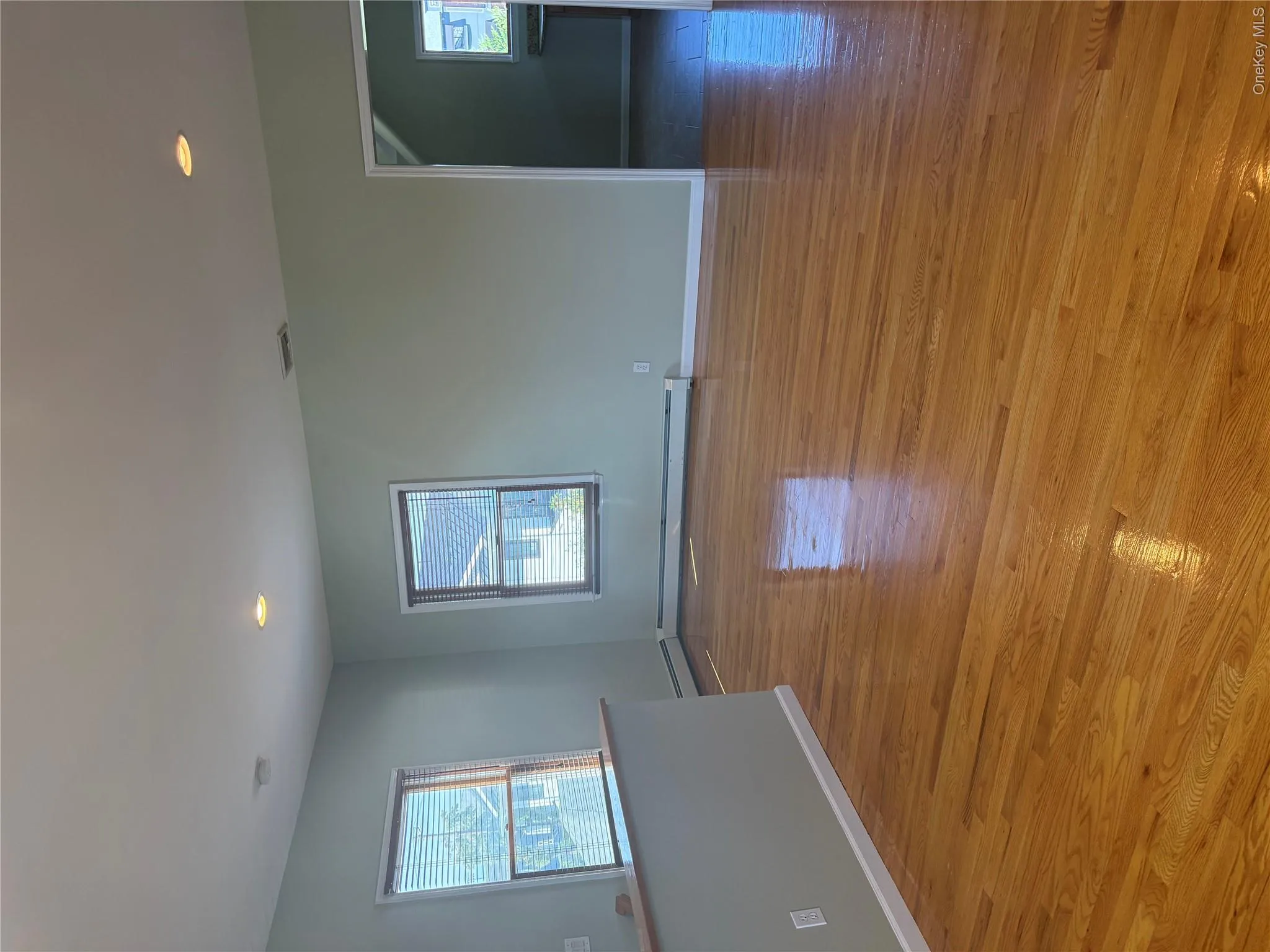 2nd Floor. Sun Filled Living Room with Gleaming Hardwood Floors 2nd Floor. Sun Filled Living Room with Gleaming Hardwood Floors