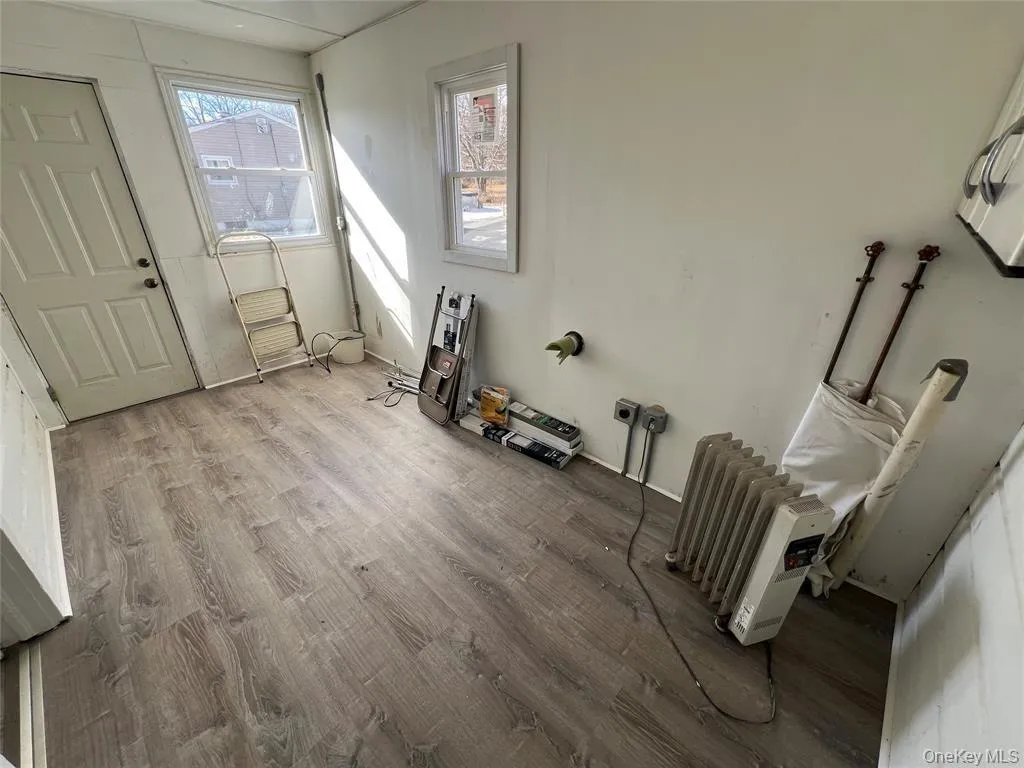 Laundry area with washer/dryer hookups and convenient side entrance. Laundry area with washer/dryer hookups and convenient side entrance.