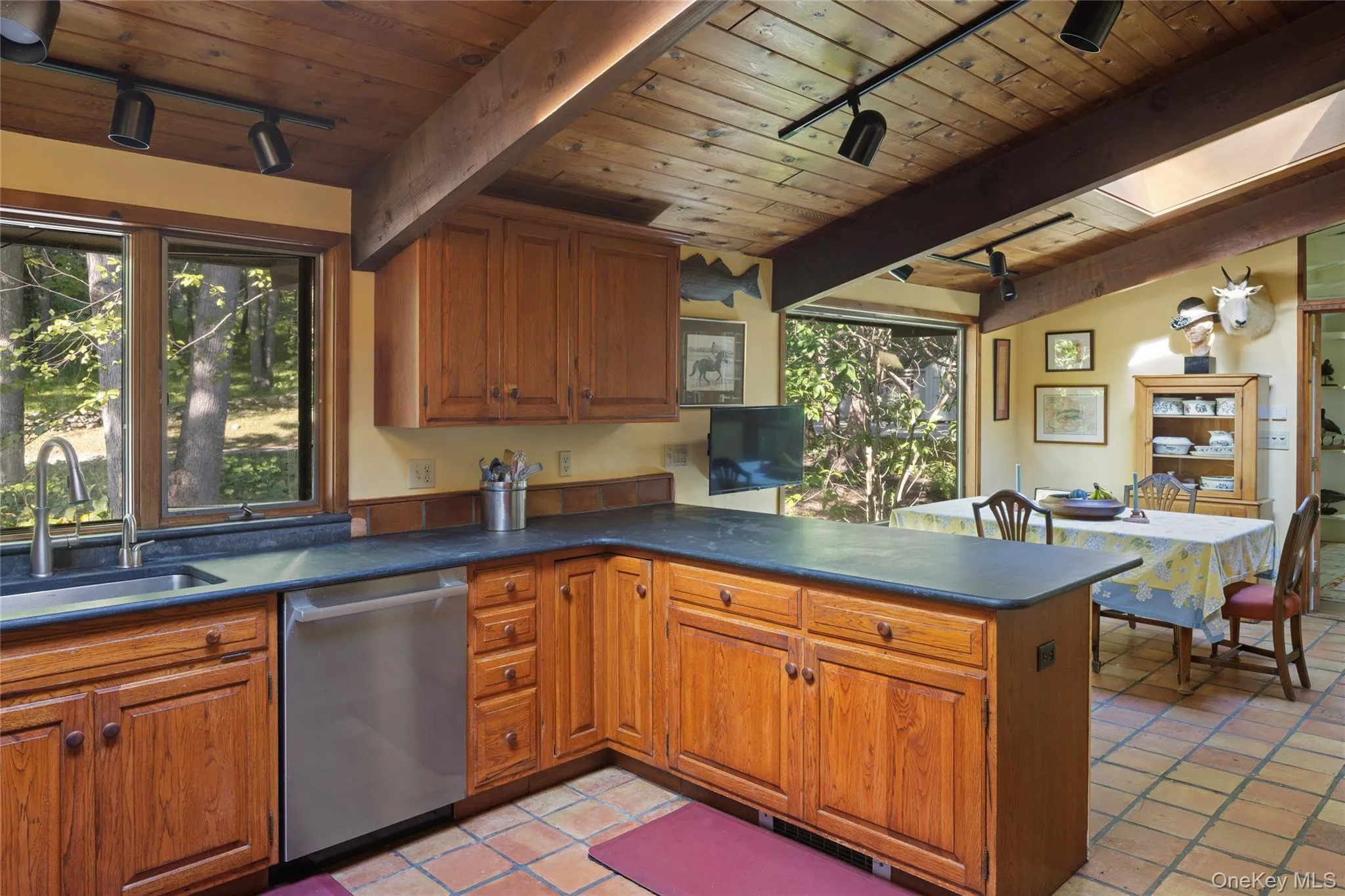 Country Kitchen with skylight and wood burning stove. Country Kitchen with skylight and wood burning stove.