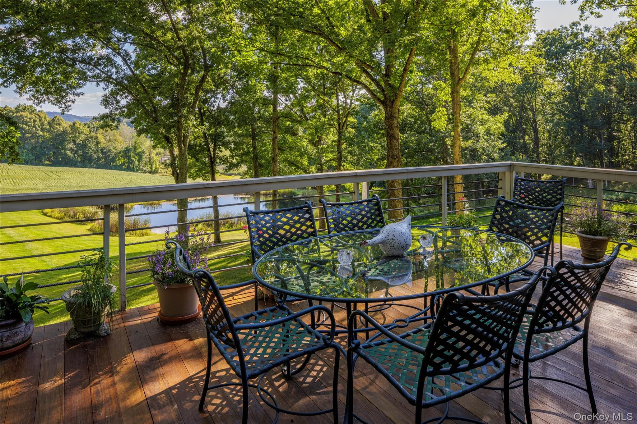 Overlooking stunning views of the property and neighboring countryside. Overlooking stunning views of the property and neighboring countryside.