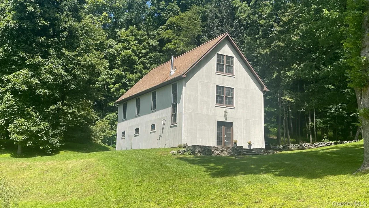 Three car garage with second floor office. Three car garage with second floor office.