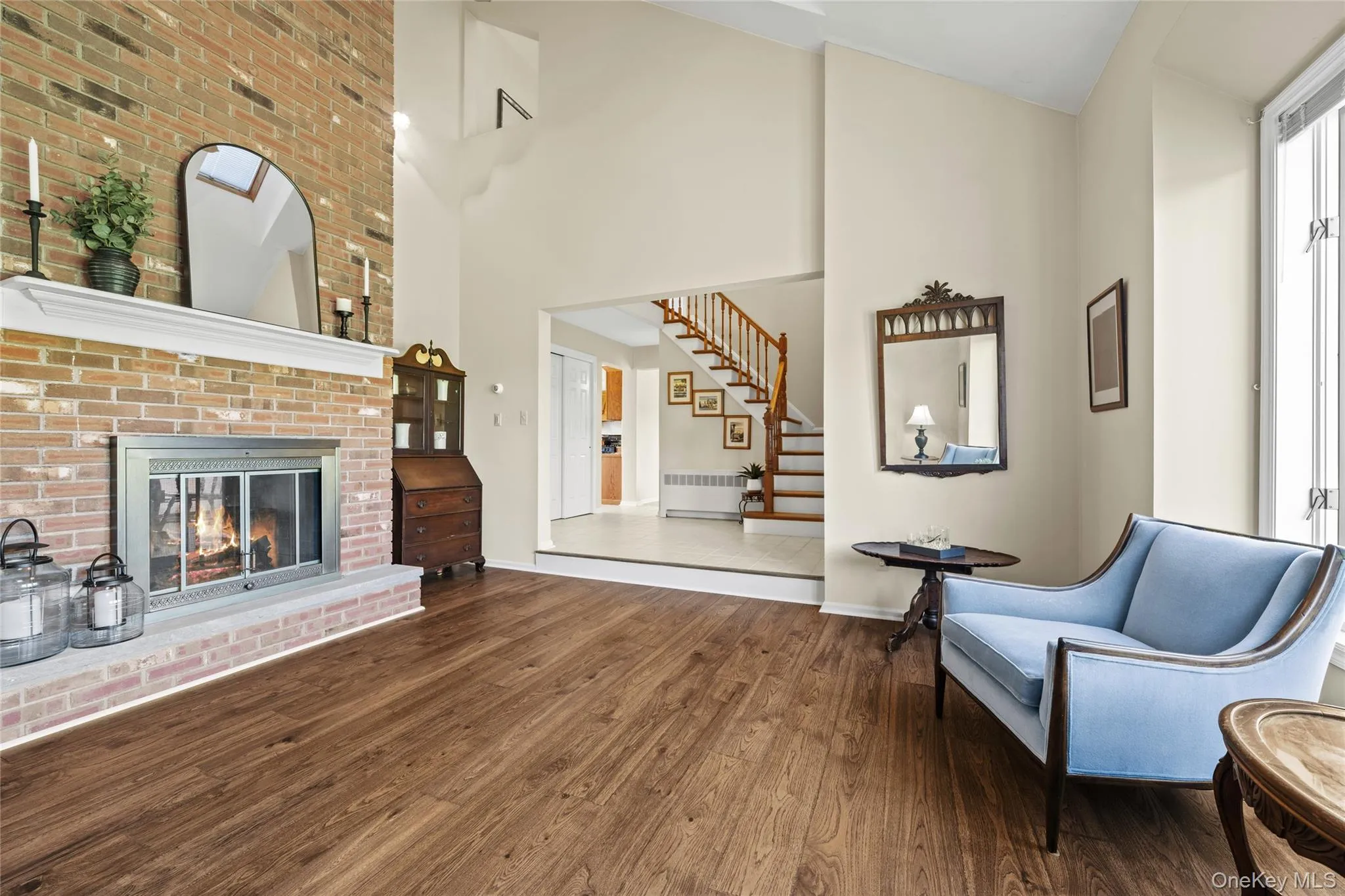 Woodburning Fireplace with Brick Surround Woodburning Fireplace with Brick Surround