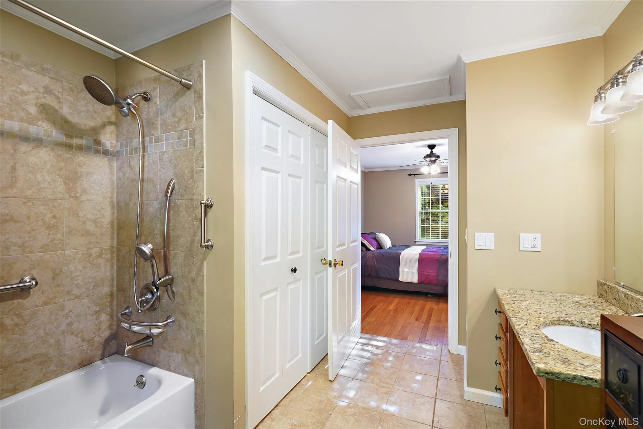 Bathroom with laundry room (double doors on the left is laundry) Bathroom with laundry room (double doors on the left is laundry)