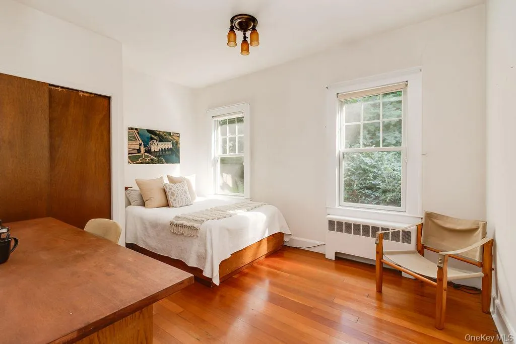 Second sunny bedroom with hardwood floors Second sunny bedroom with hardwood floors