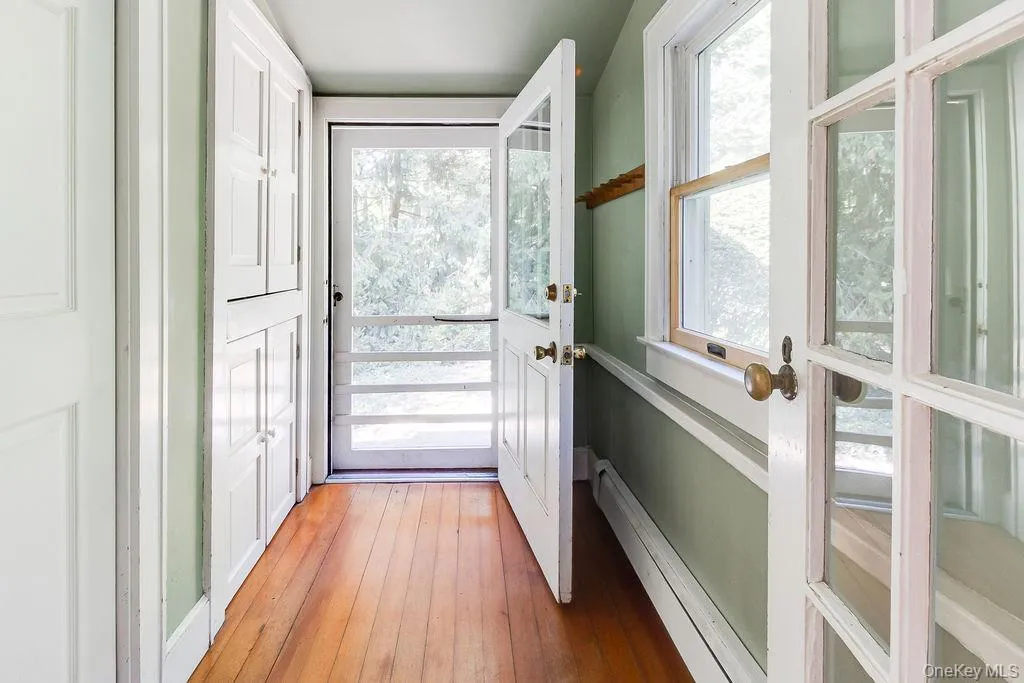 Entry foyer with closet and built-in cabinets Entry foyer with closet and built-in cabinets