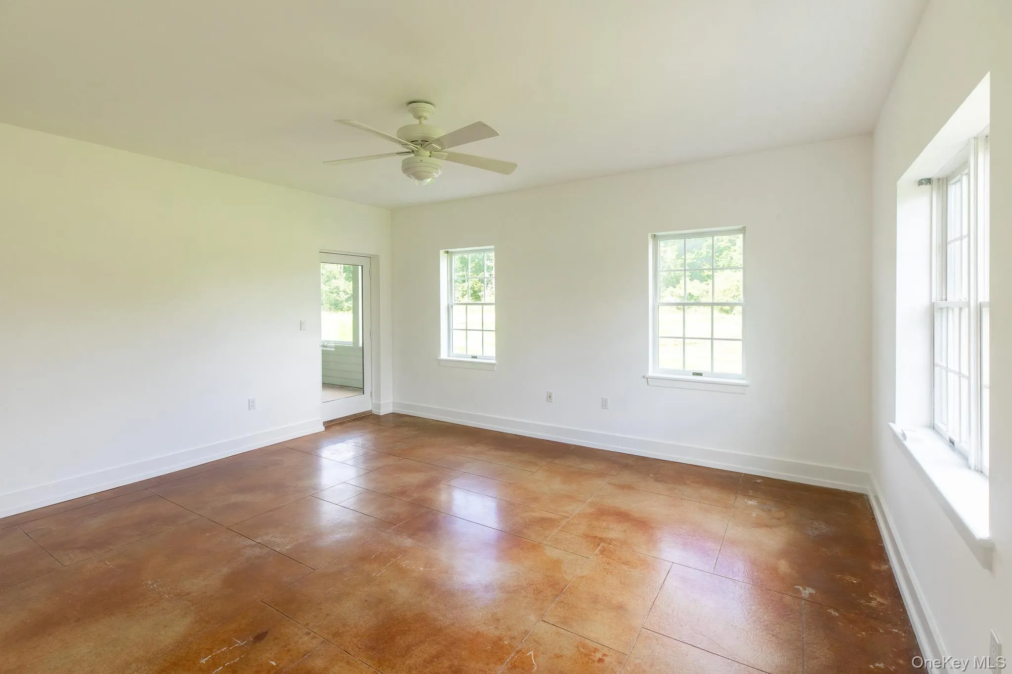 Primary suite with access to the screened porch Primary suite with access to the screened porch