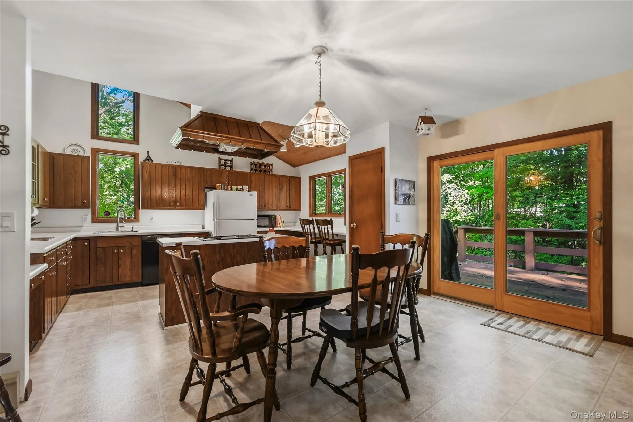 With sliding glass doors to large deck With sliding glass doors to large deck