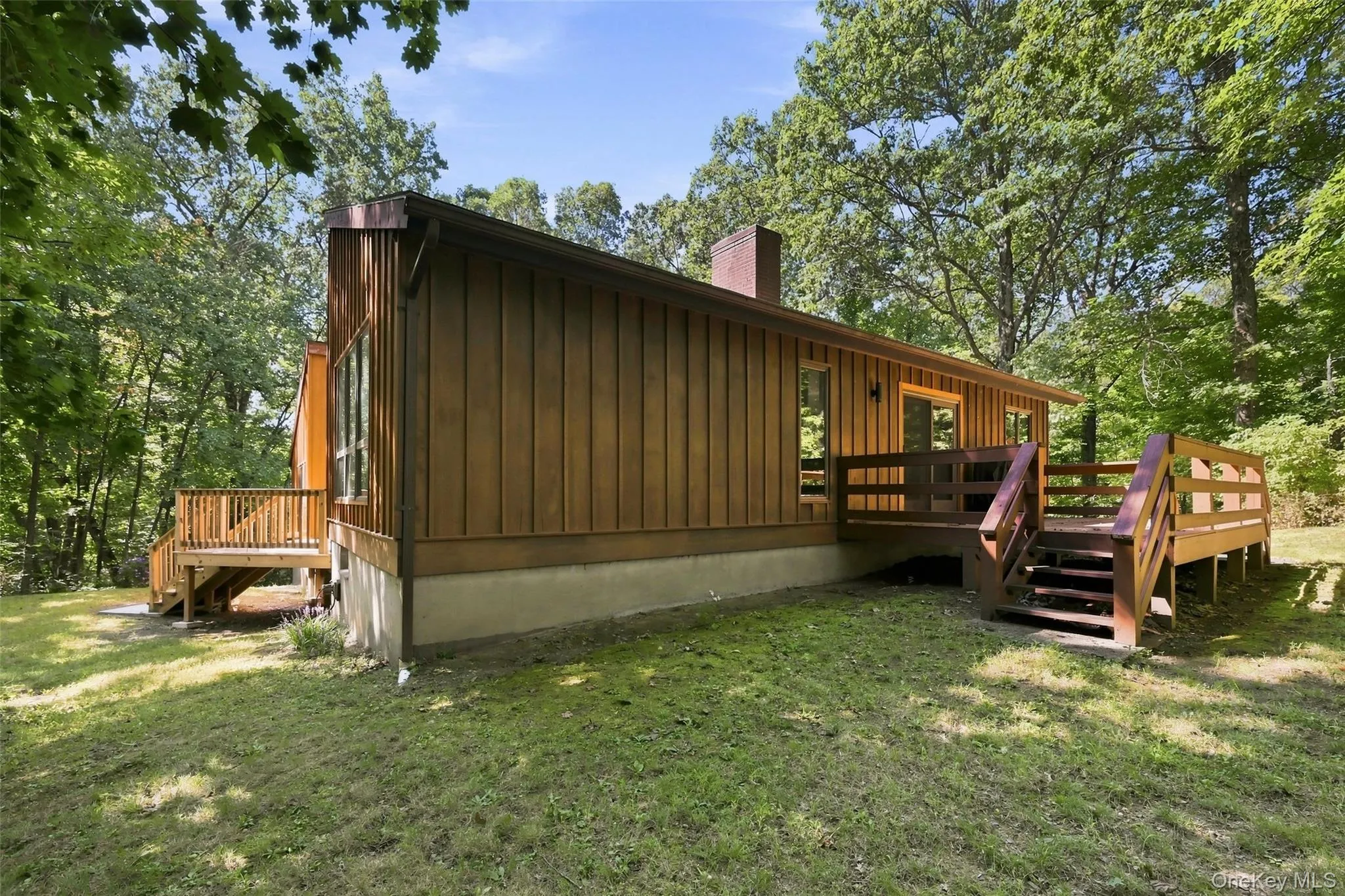 With large deck off of dining area With large deck off of dining area