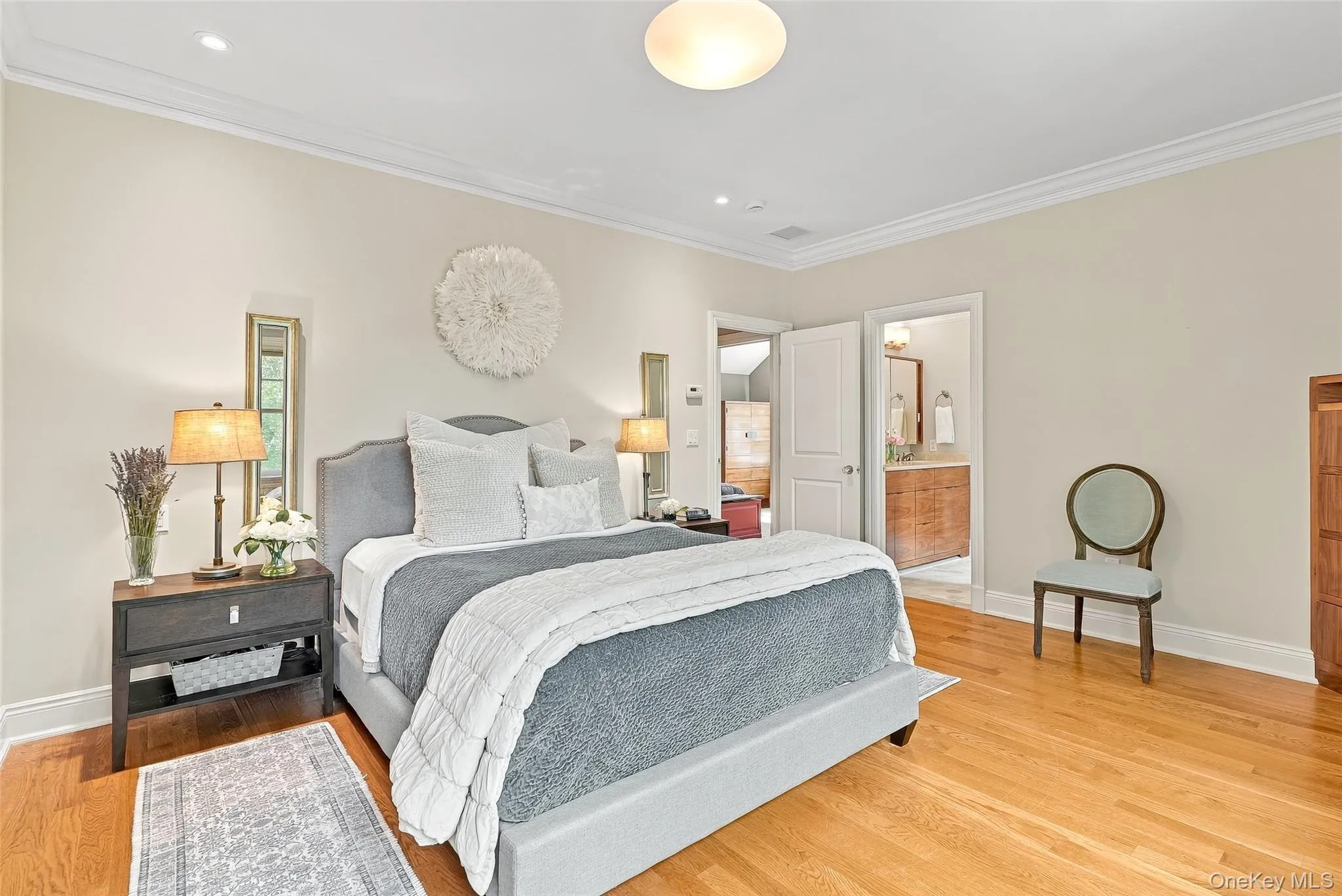 Primary Bedroom with WI Closet and ensuite Primary Bath with stunning treetop views Primary Bedroom with WI Closet and ensuite Primary Bath with stunning treetop views