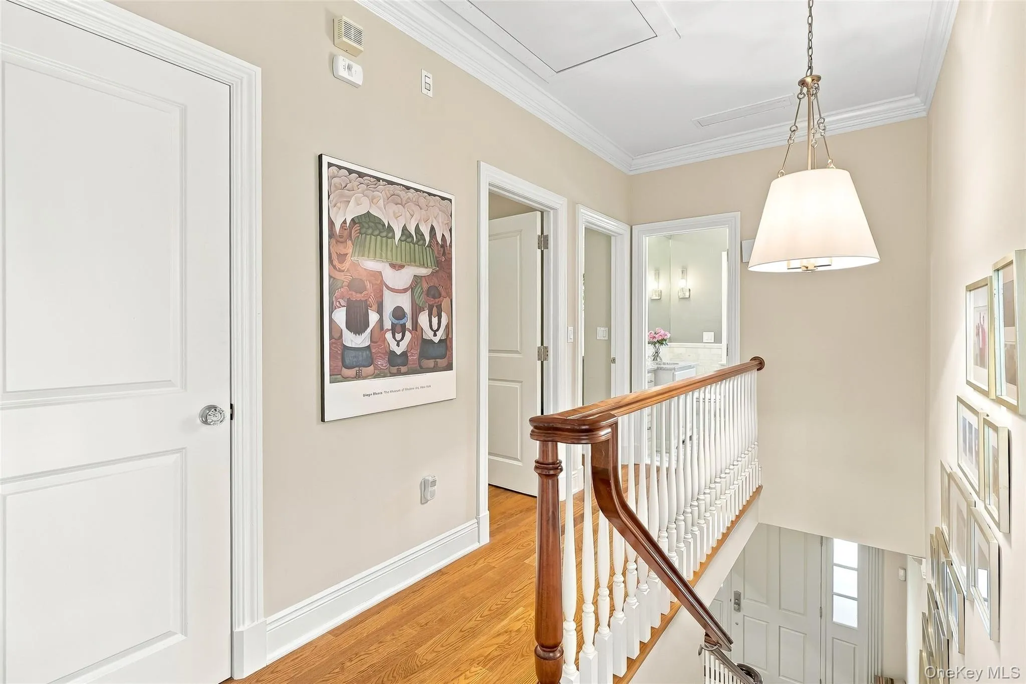 Second Floor Hallway with Bessler Stairs access to Attic Second Floor Hallway with Bessler Stairs access to Attic