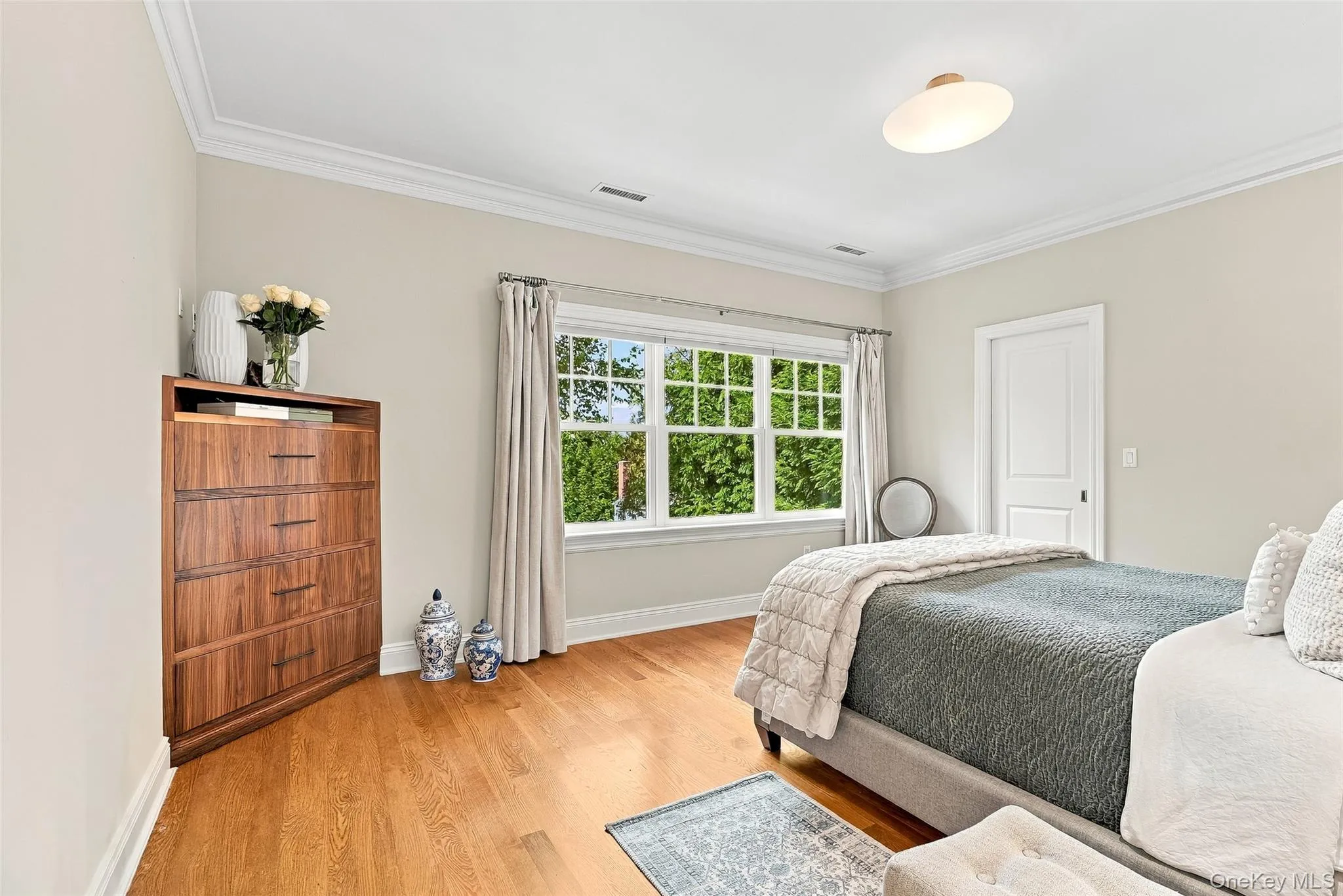 Primary Bedroom with WI Closet and ensuite Primary Bath with stunning treetop views Primary Bedroom with WI Closet and ensuite Primary Bath with stunning treetop views