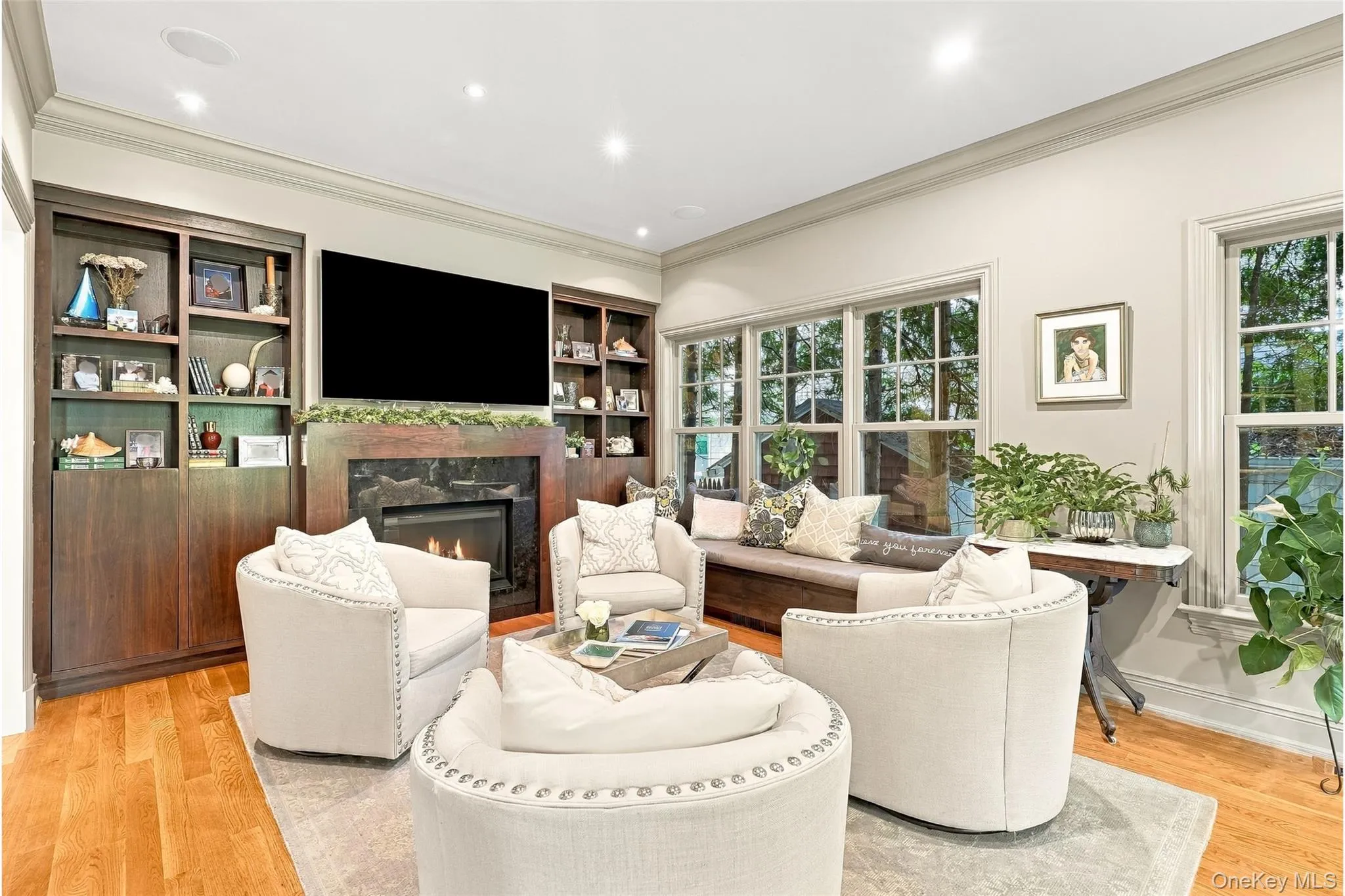 Living Room with Built-in cabinetry and custom bench seating Living Room with Built-in cabinetry and custom bench seating