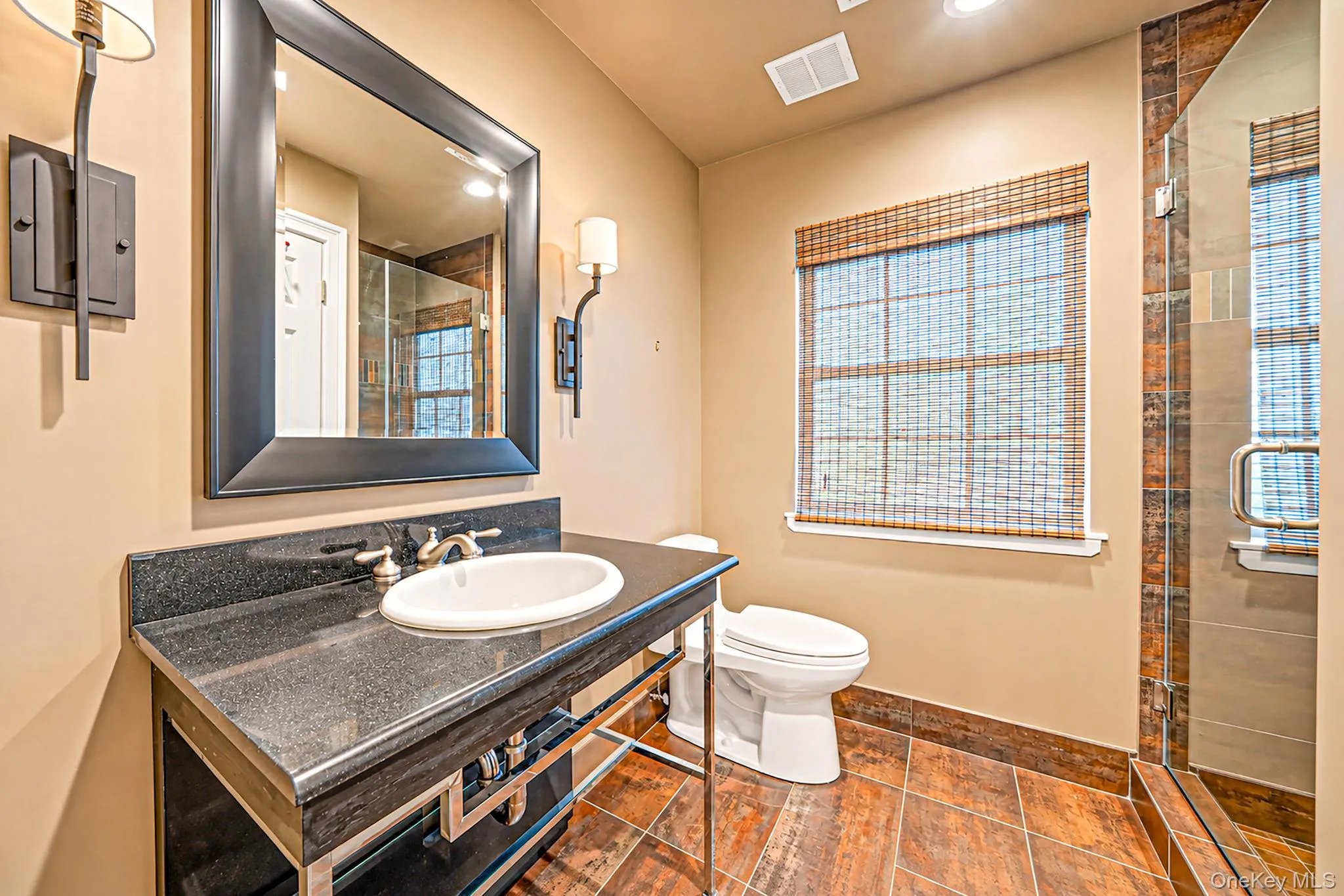 Full bathroom with stall shower Full bathroom with stall shower