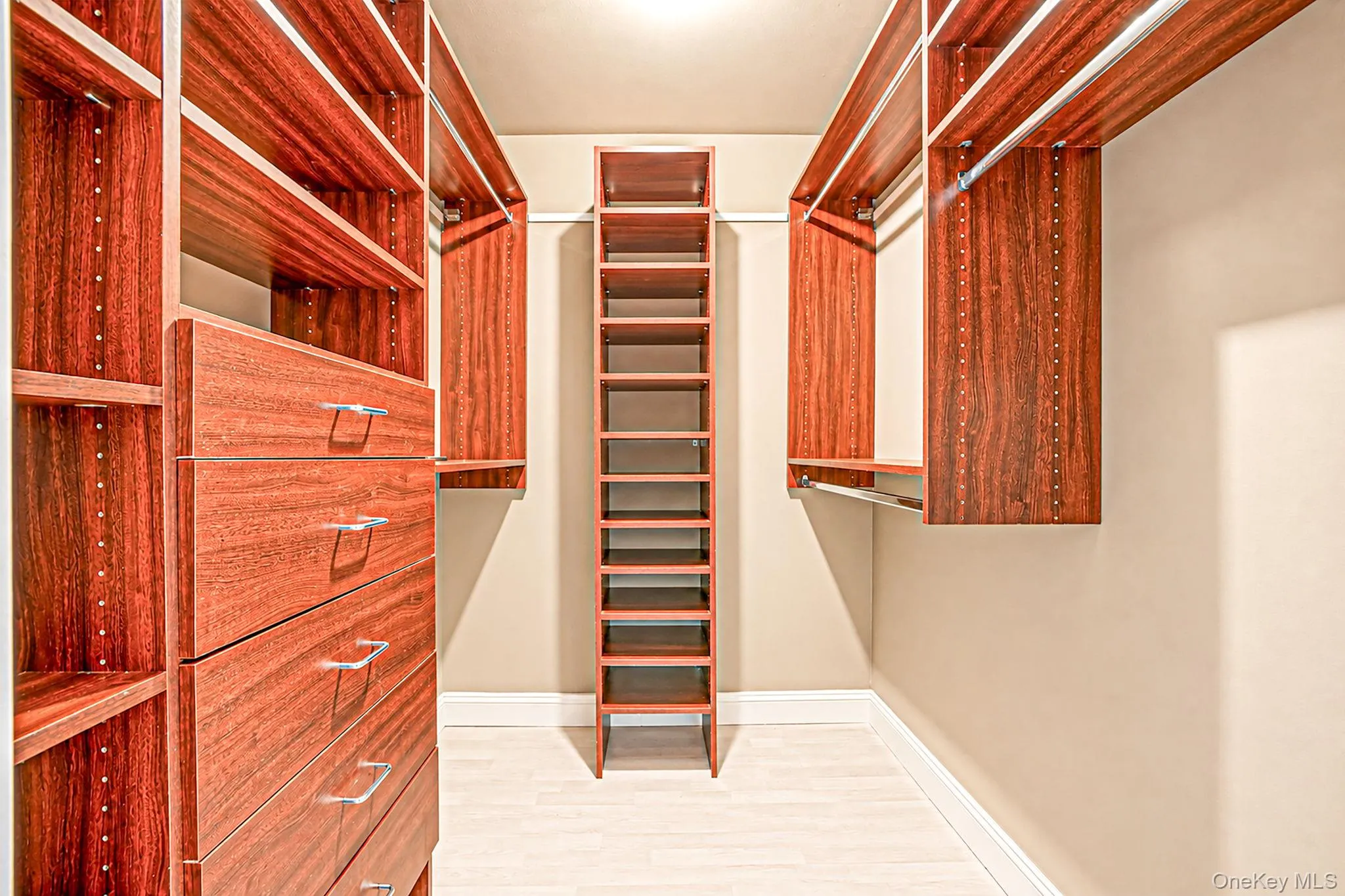 Closet system in primary bedroom Closet system in primary bedroom