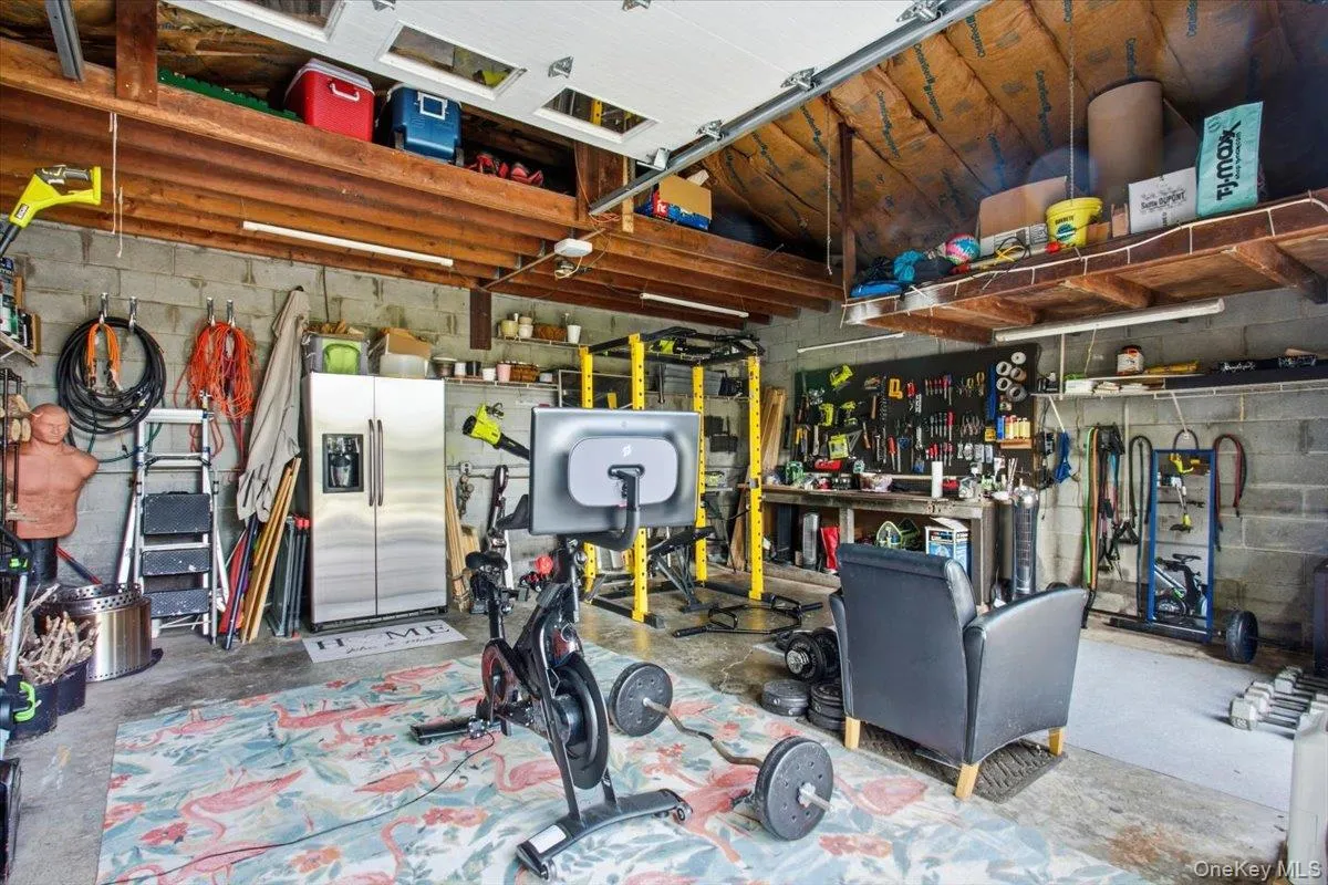 View of the oversized garage with plenty of space for storage. There are endless possilities for finishing the space. View of the oversized garage with plenty of space for storage. There are endless possilities for finishing the space.