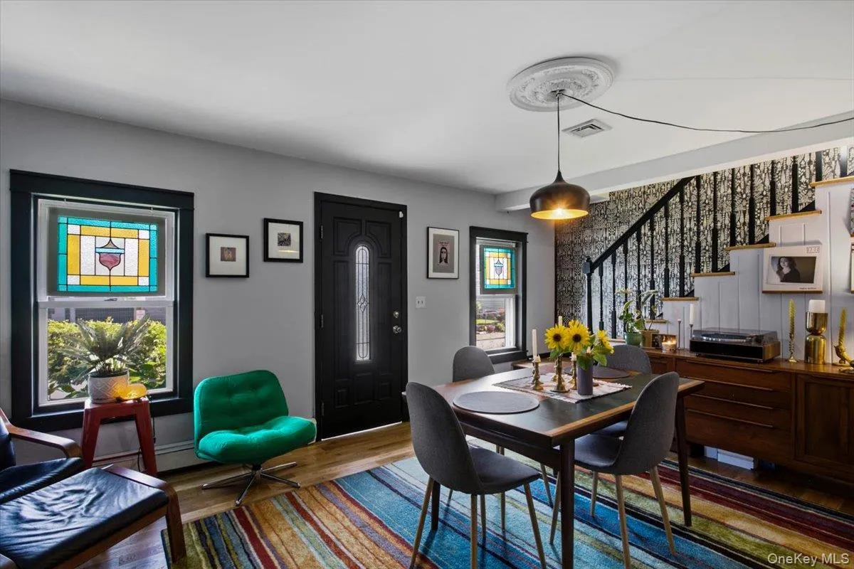 The stairs lead up to the second floor which offers three bedrooms and a second full bathroom. The stairs lead up to the second floor which offers three bedrooms and a second full bathroom.