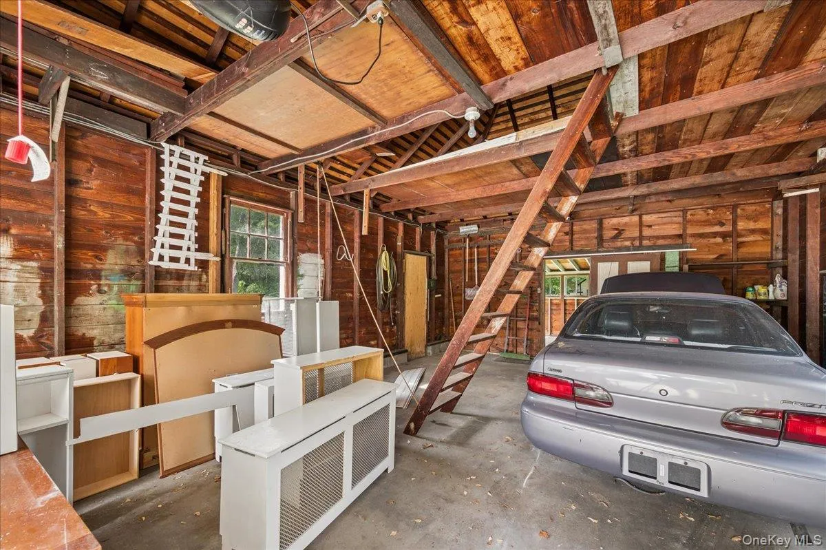 Four car deep garage with loft. Four car deep garage with loft.