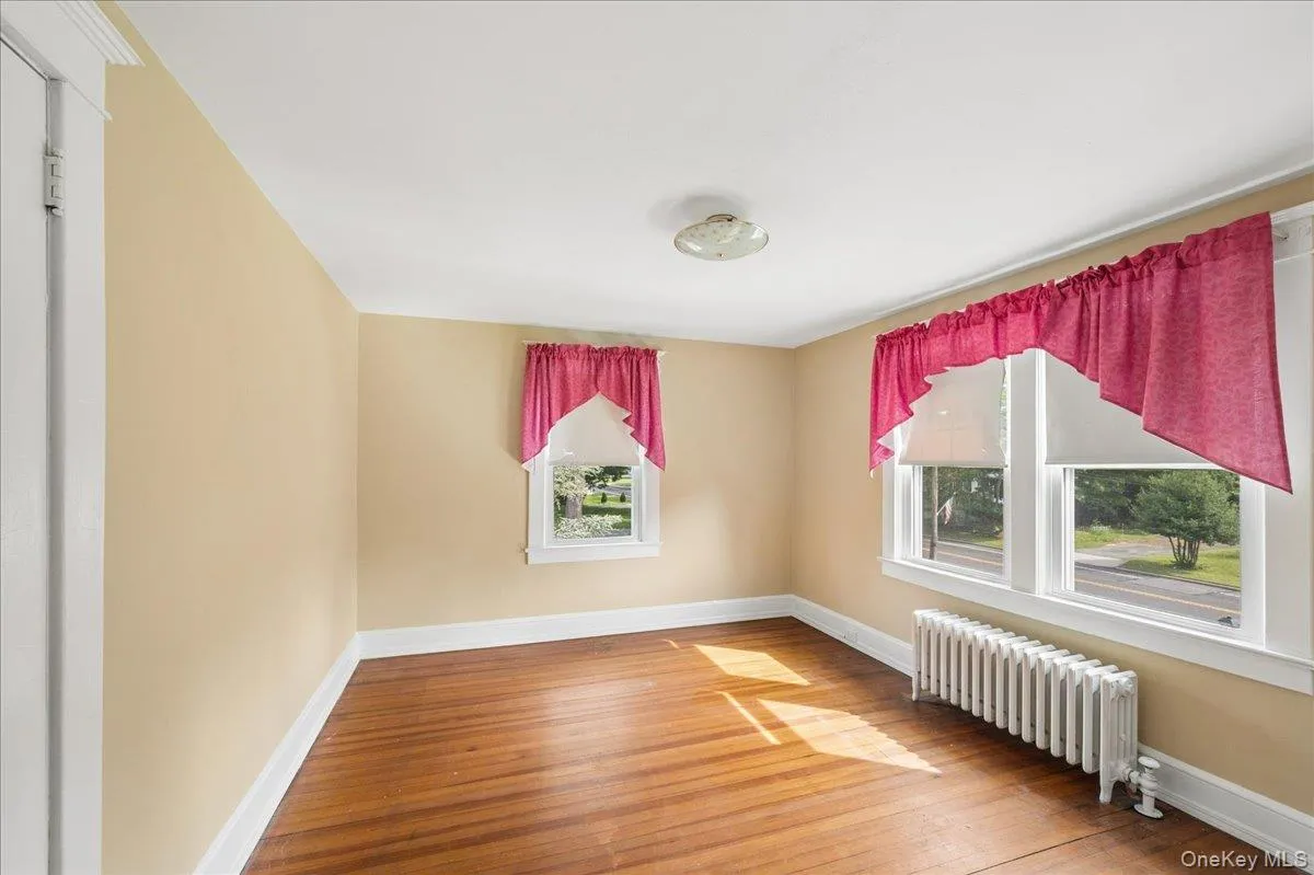 Fourth bedroom with access to walkup attic. Fourth bedroom with access to walkup attic.