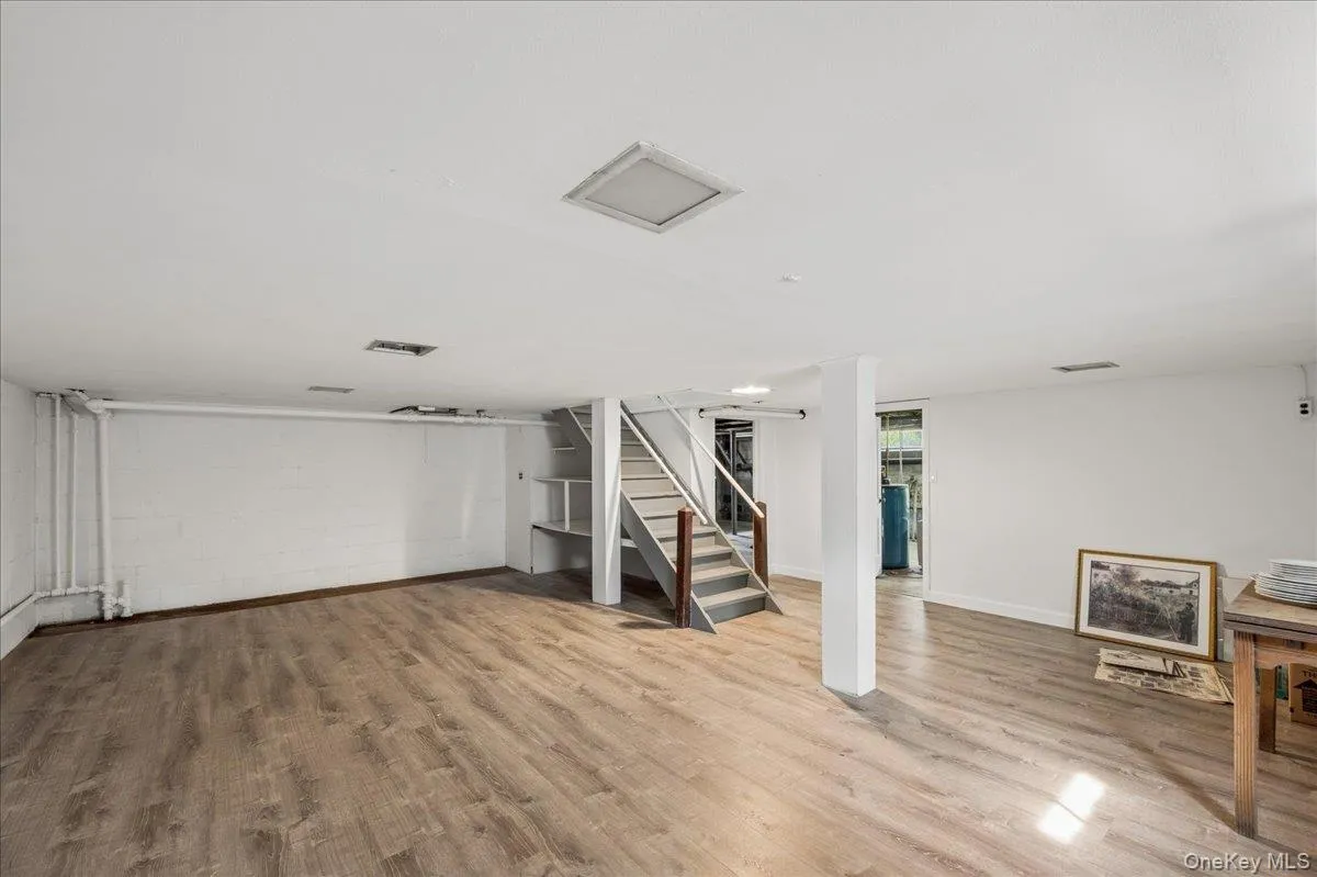 Partially finished room within the full basement. Partially finished room within the full basement.