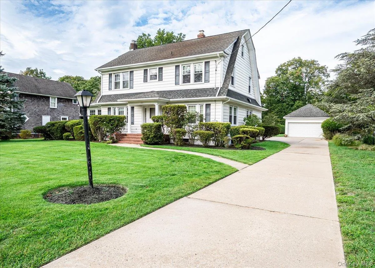 Long expansive driveway leading to your 4-car garage with ample parking. Long expansive driveway leading to your 4-car garage with ample parking.