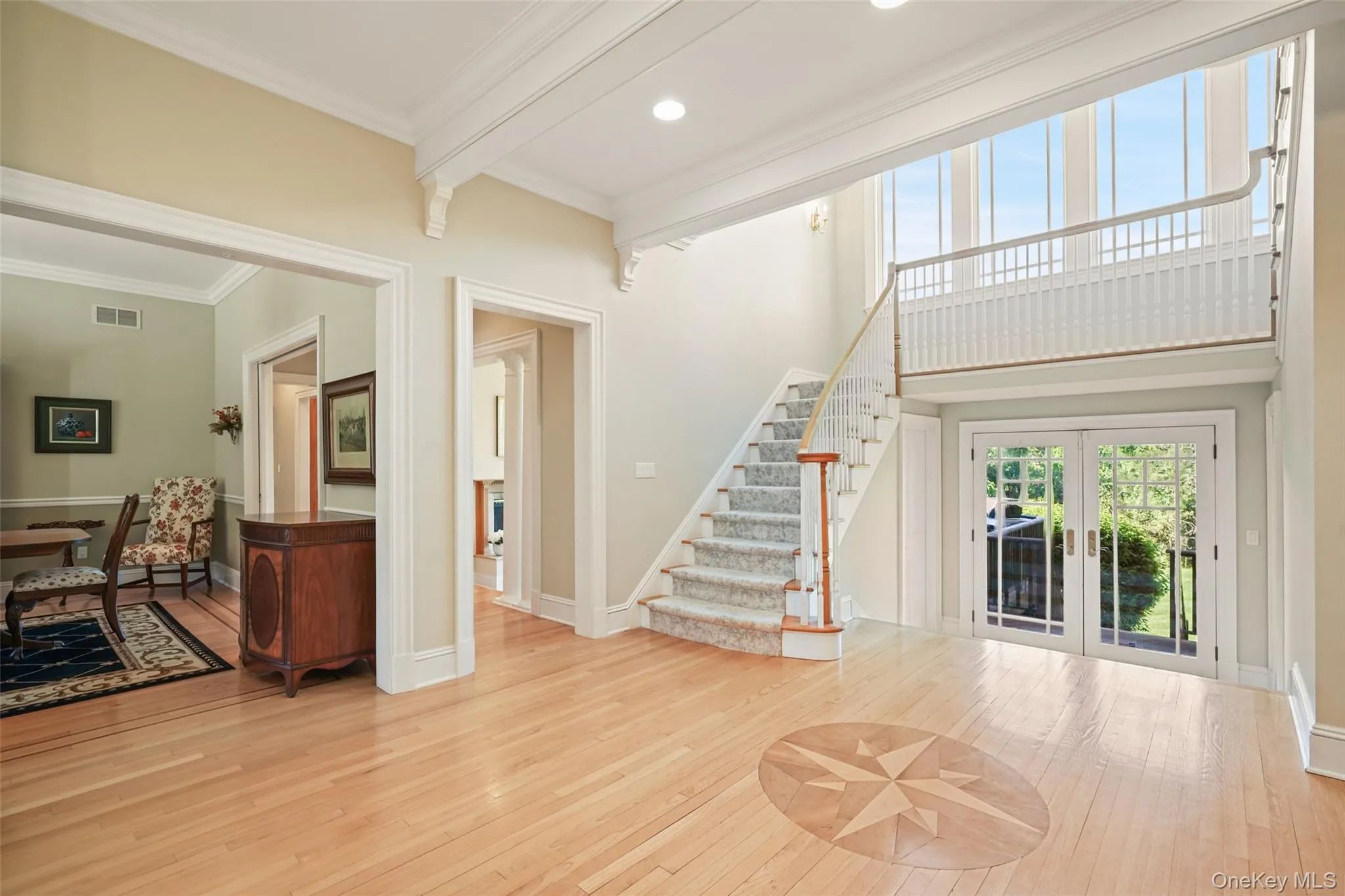 Gracious entry with inlay hardwood floors. Gracious entry with inlay hardwood floors.