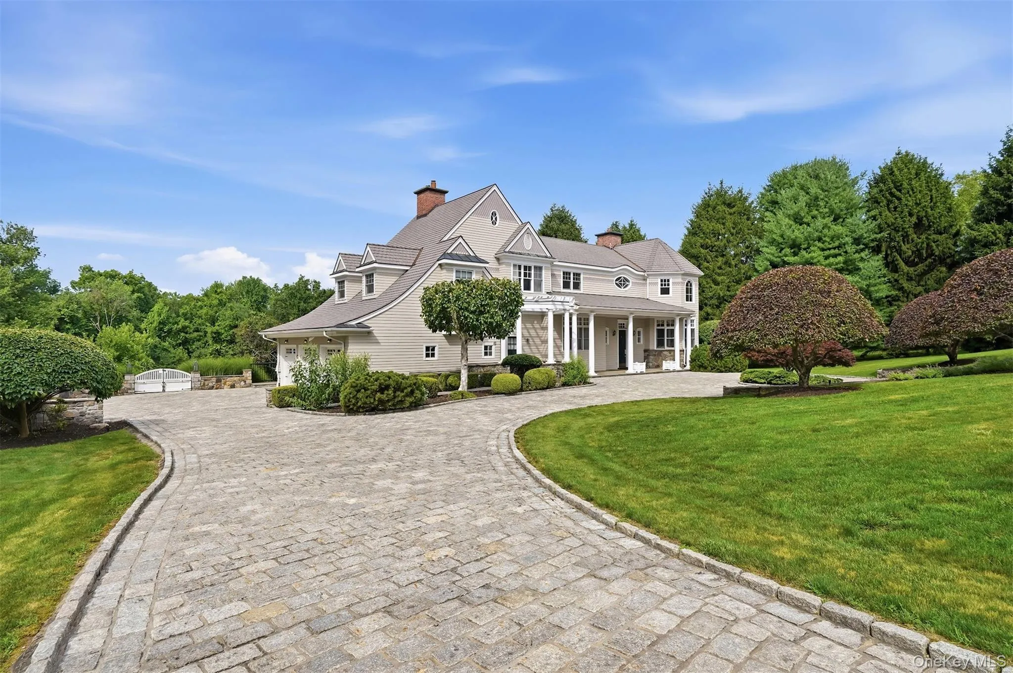 Elegant style, lush landscape for beautiful curb appeal. Elegant style, lush landscape for beautiful curb appeal.