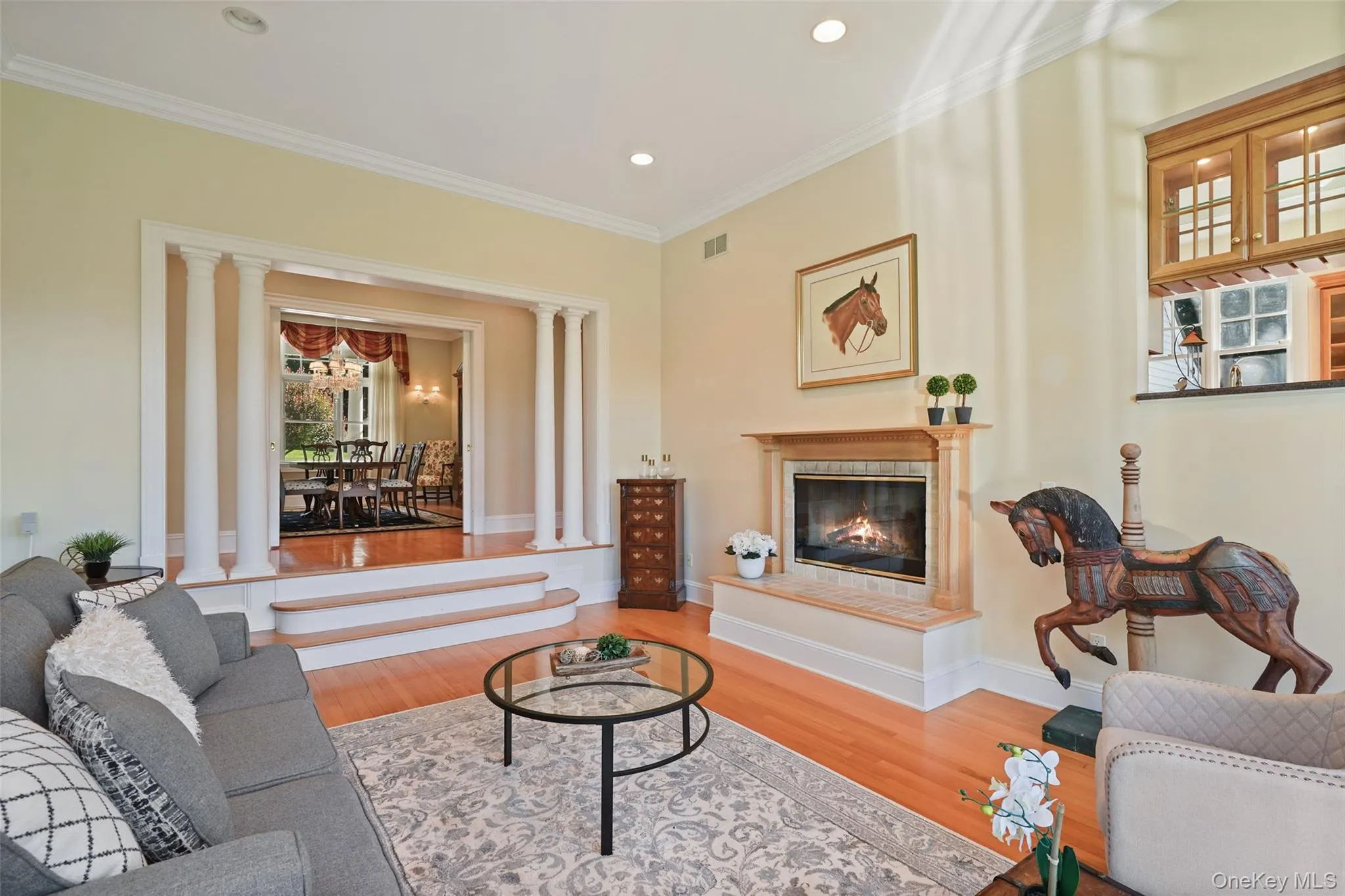 Open to kitchen with warm fireplace Open to kitchen with warm fireplace